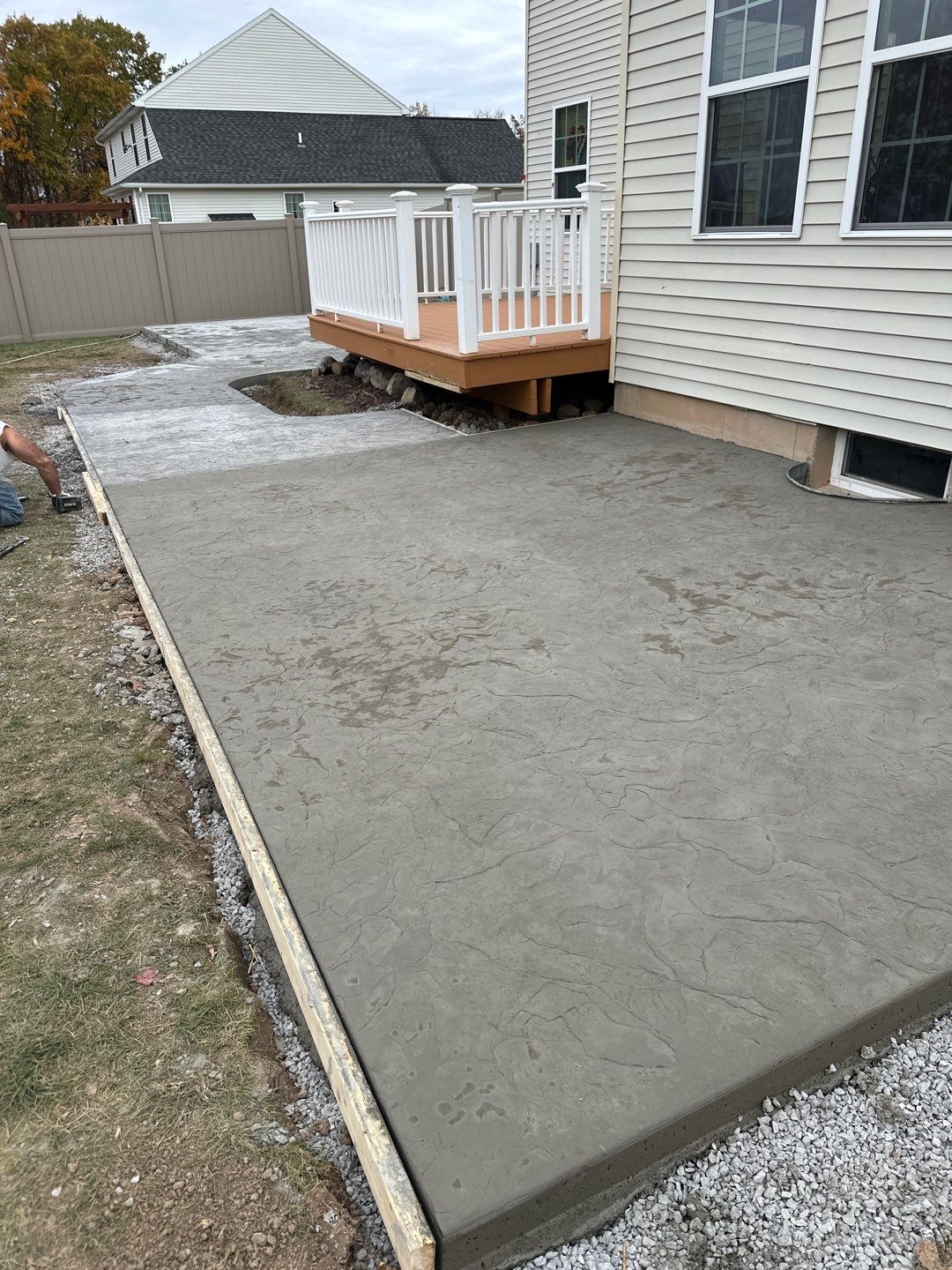 Oxford Slate stamped concrete patio  by NG Masonry & Construction LLC