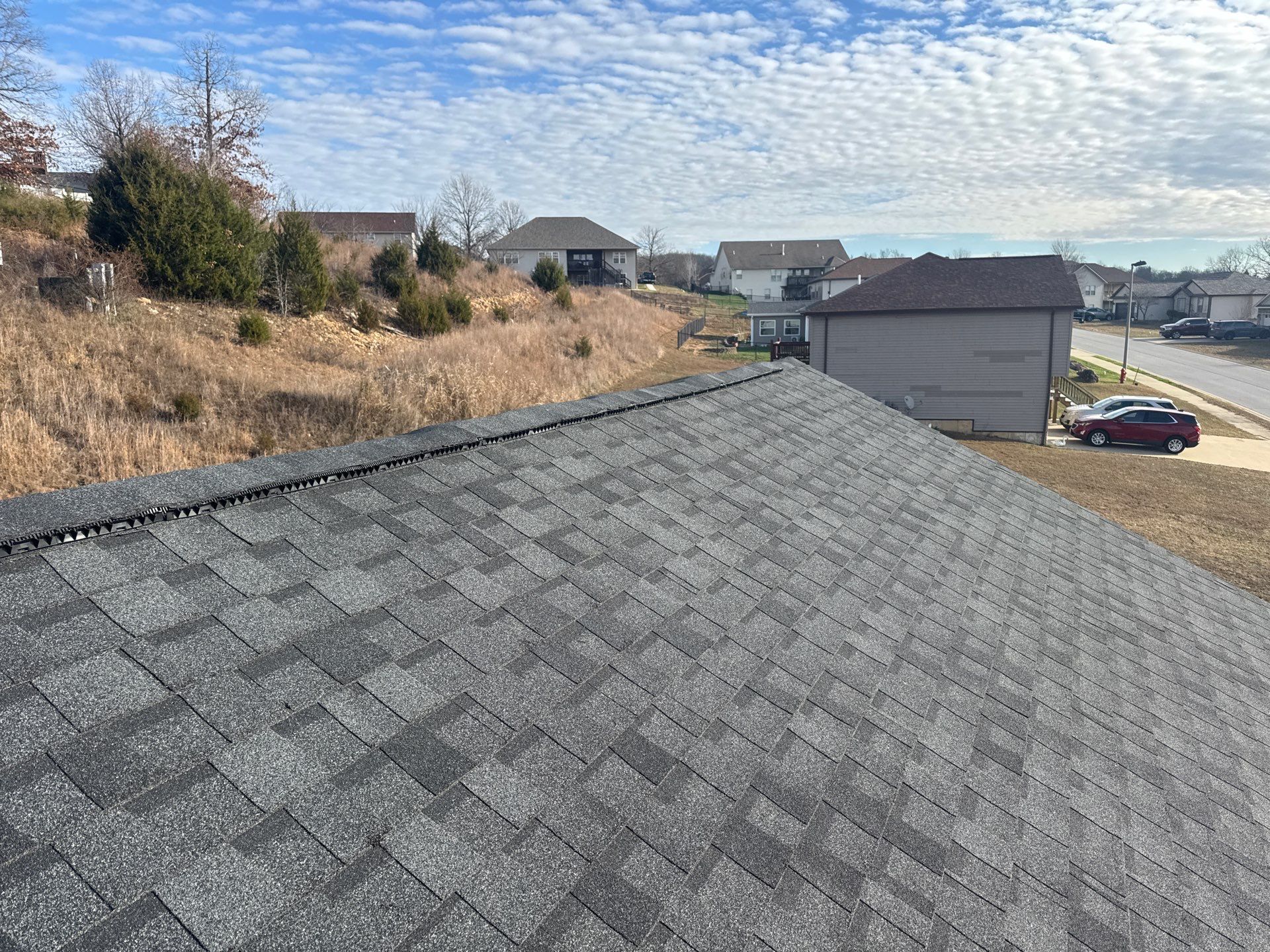 Residential Roofing + Gutter & Downspouts Install  by Titan Commercial & Residential Roofing 