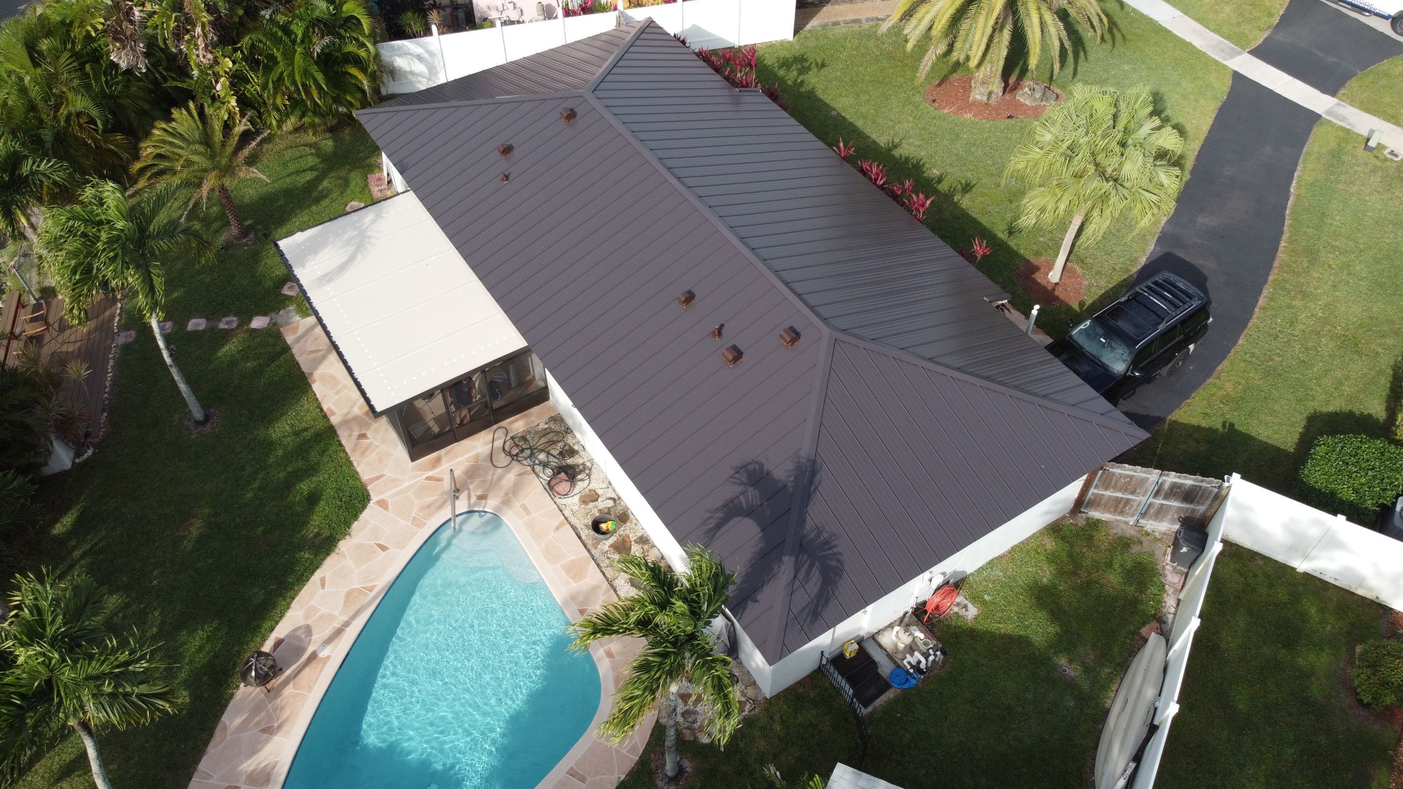 Residential Roofing Installation using 1" Nail strip metal roof by BLUES BROTHERS CONSTRUCTION CORP