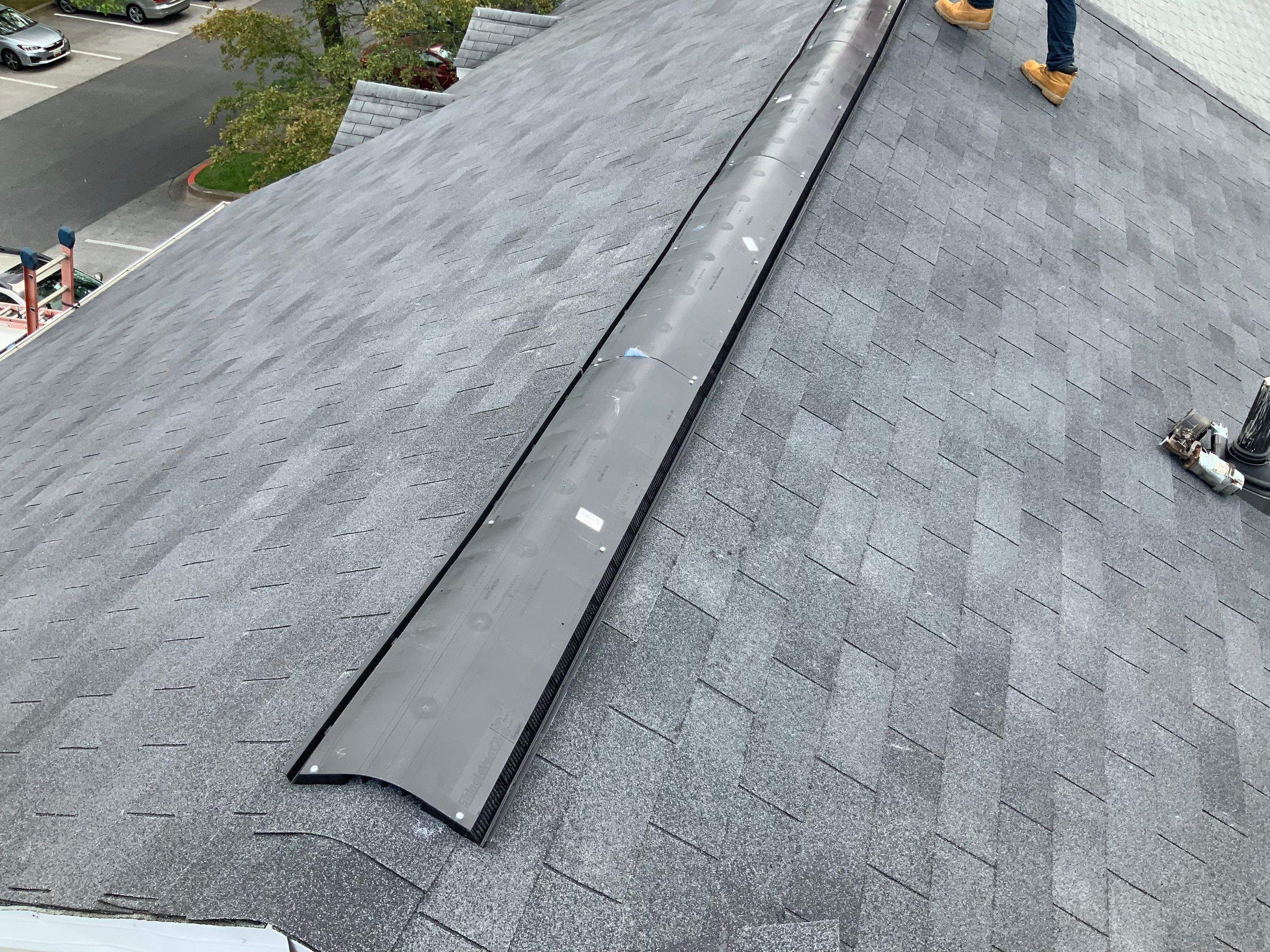 Residential Roofing Installation using XT-25 Color Moire Black by Alpha Design Services