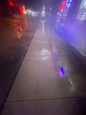 Commercial sidewalk cleaning.