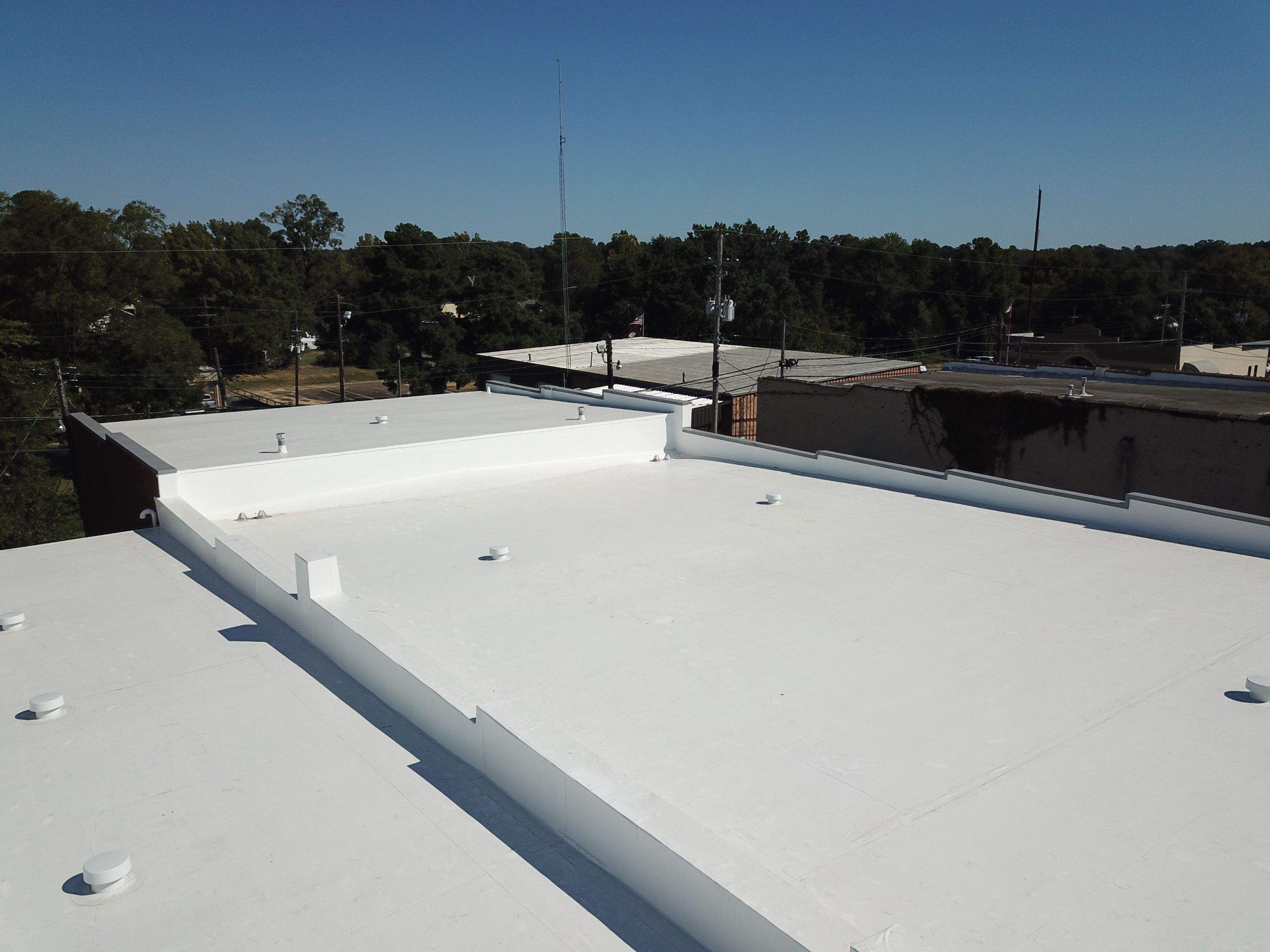 Commercial Roofing Installation in DeQueen, AR, using 50 mil PVC by Hostetler Roofing