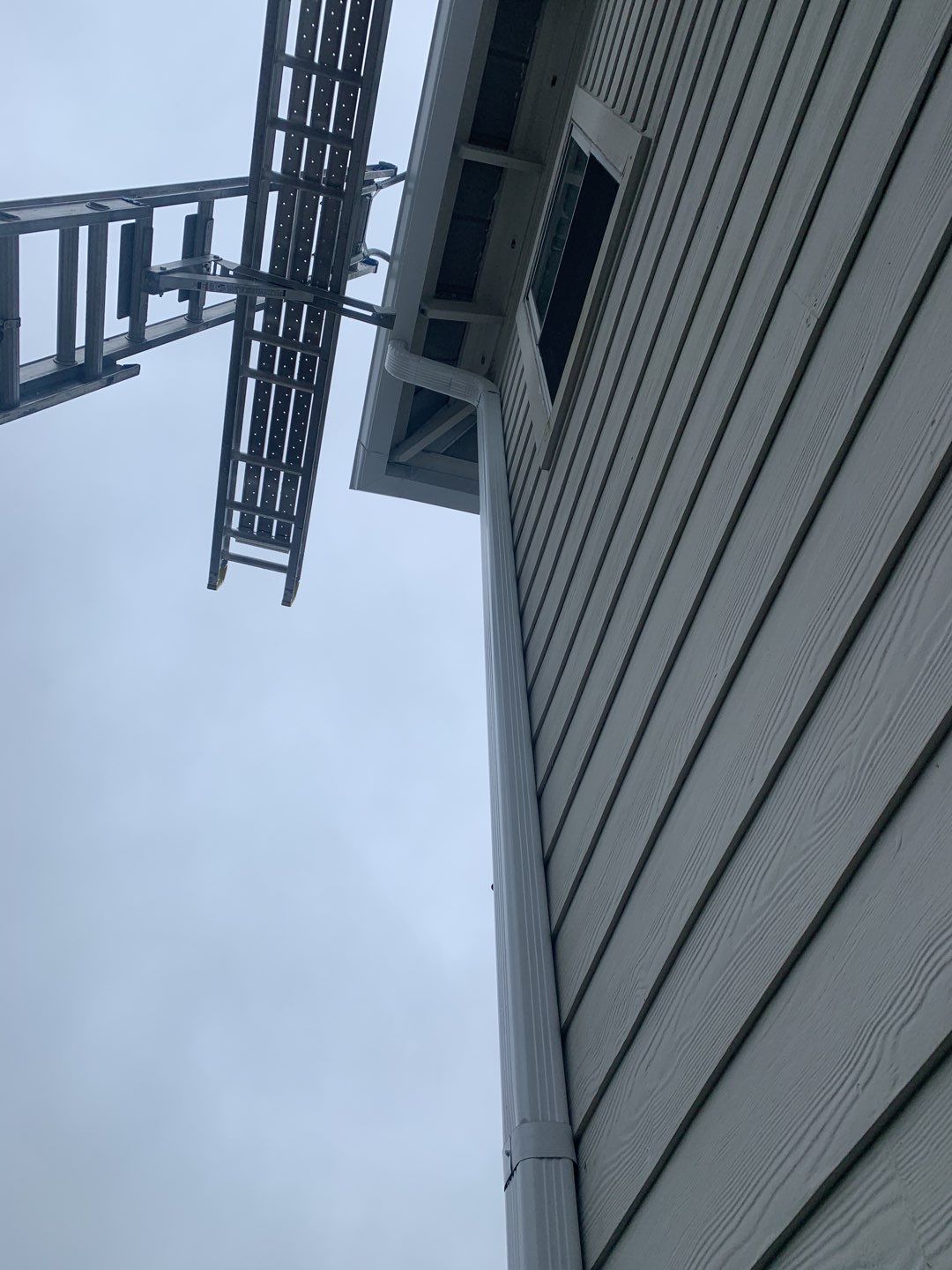 Seamless Gutter Installation Using White K-Style Gutters by Gutter Professors