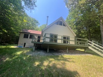 Log Cabin Exterior Restoration and Siding Staining in Readfield