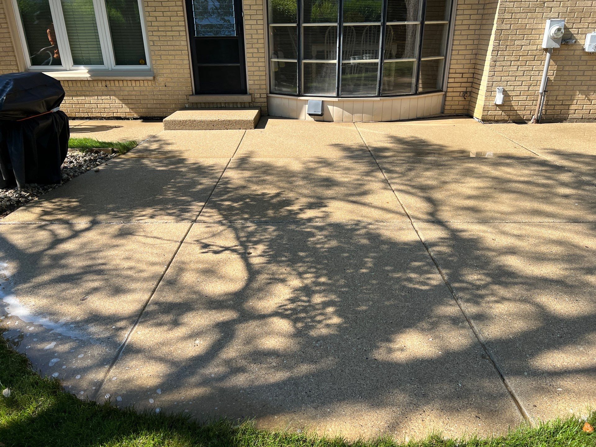 concrete patio power washing  by Northern Power Washing LLC.