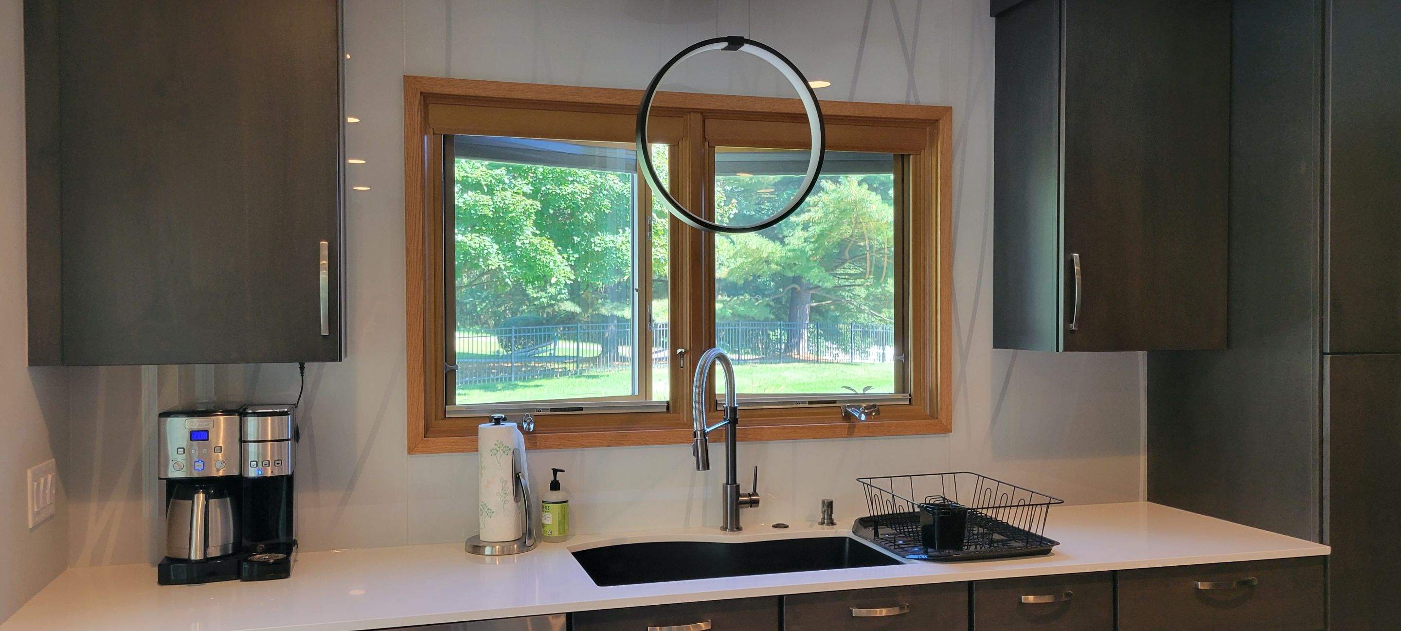 Kitchen Remodel using IMAGIO Misty Curves Solid Glass Backsplash by IMAGIO