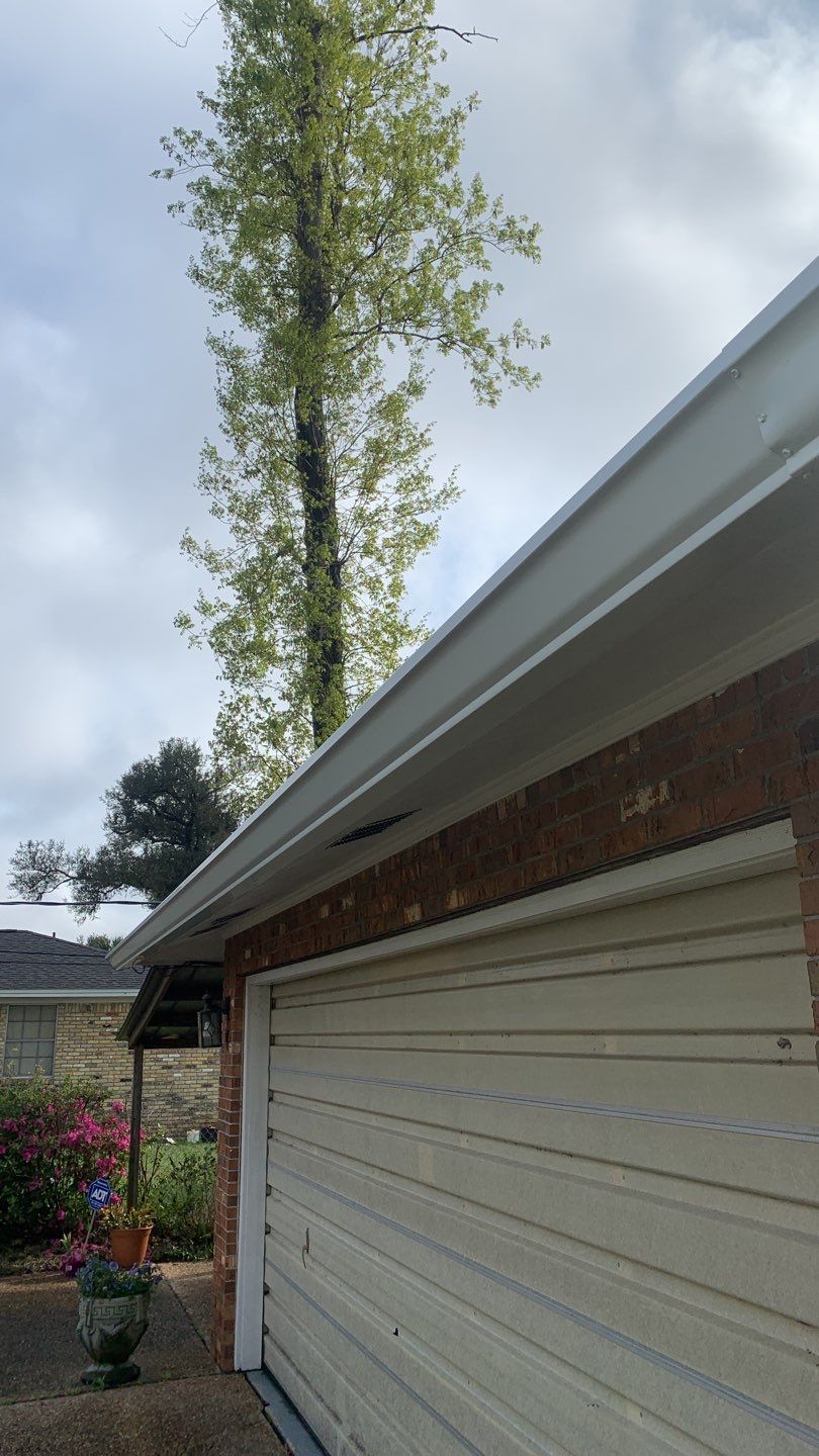Seamless Aluminum Gutter and Down Spout Installation by Gutter Professors