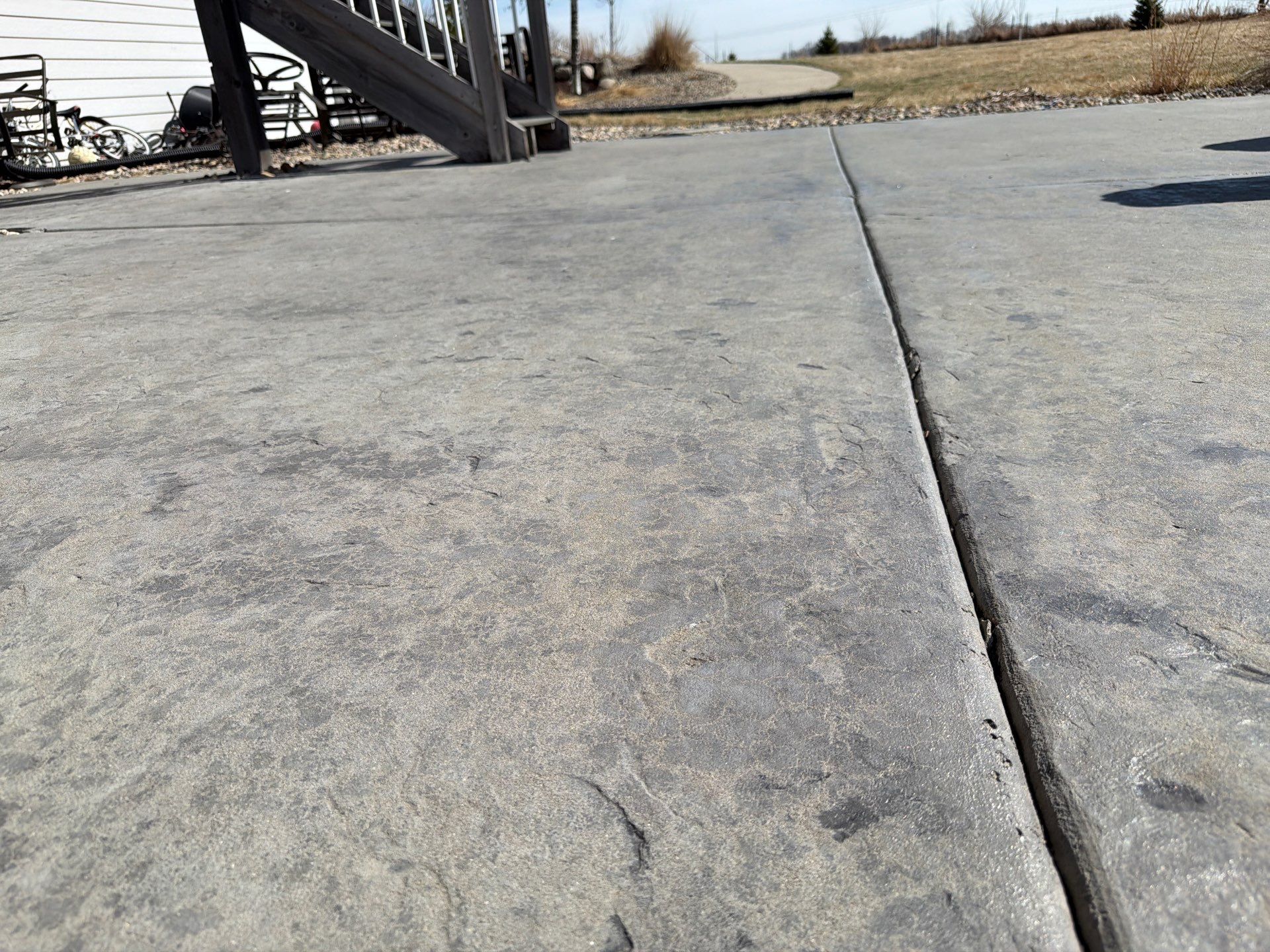 Concrete Patio Restoration and Installation in Sioux Falls by Select Painting, Coatings & Garage Cabinets
