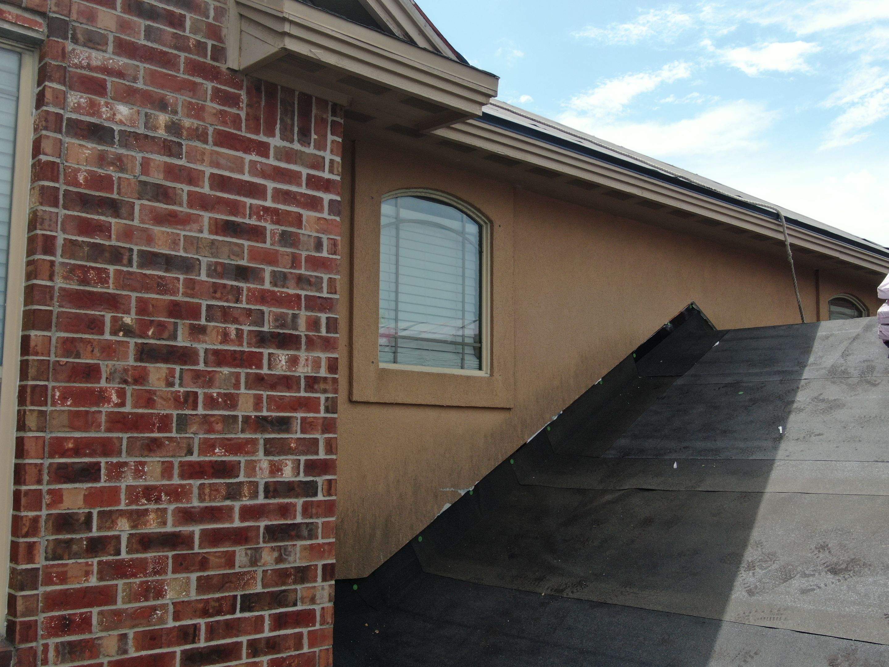Flashing Stucco above the Roof by Bayfront Roofing and Construction