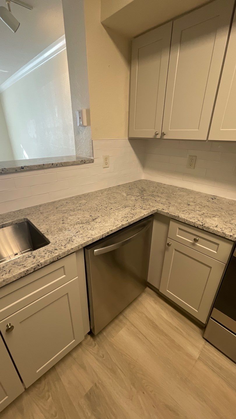 Home Remodel using LVP Flooring and Cabinets by HandyMangum