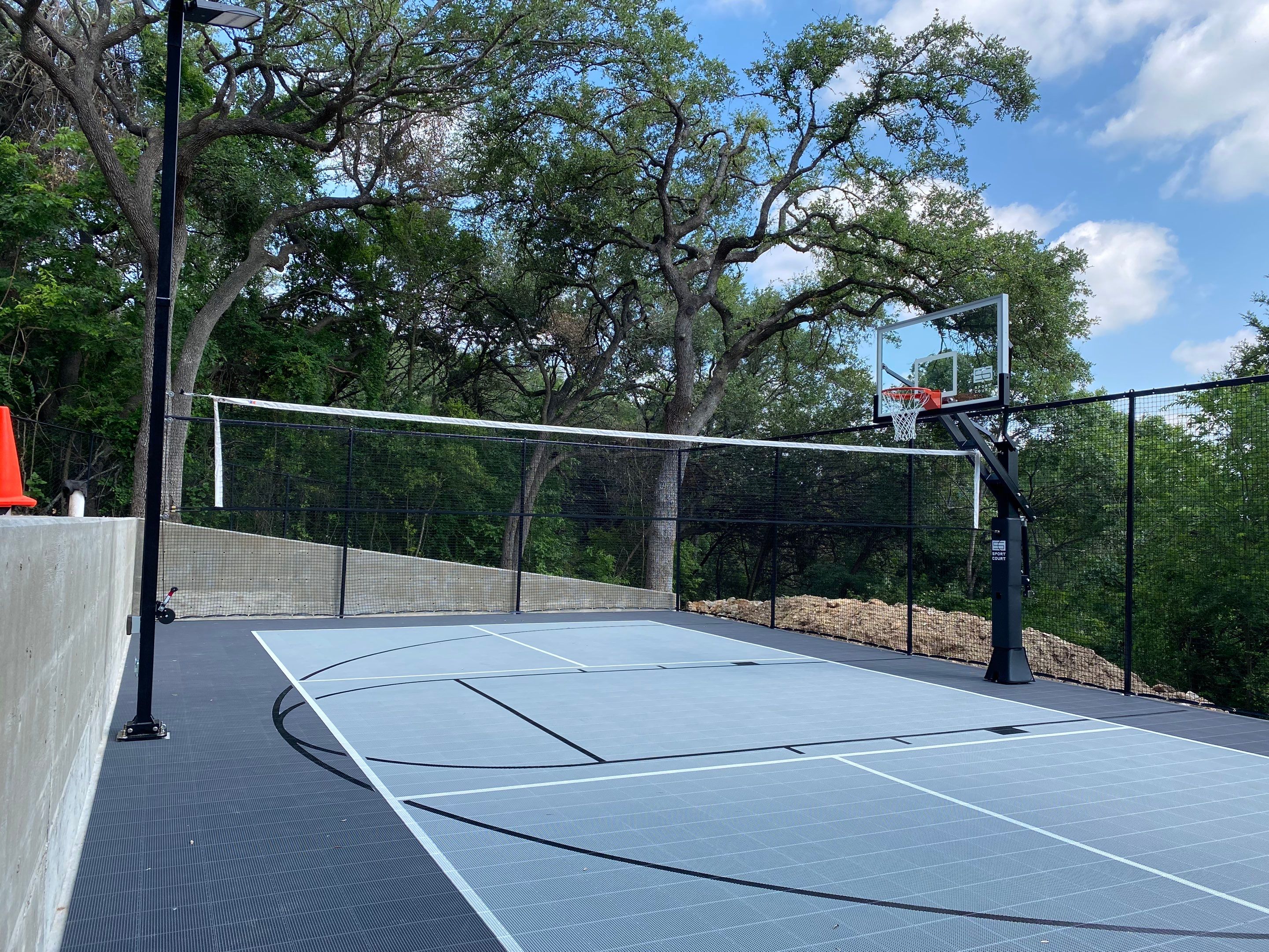 T Family 30x55 West Austin Court by Sport Court Austin