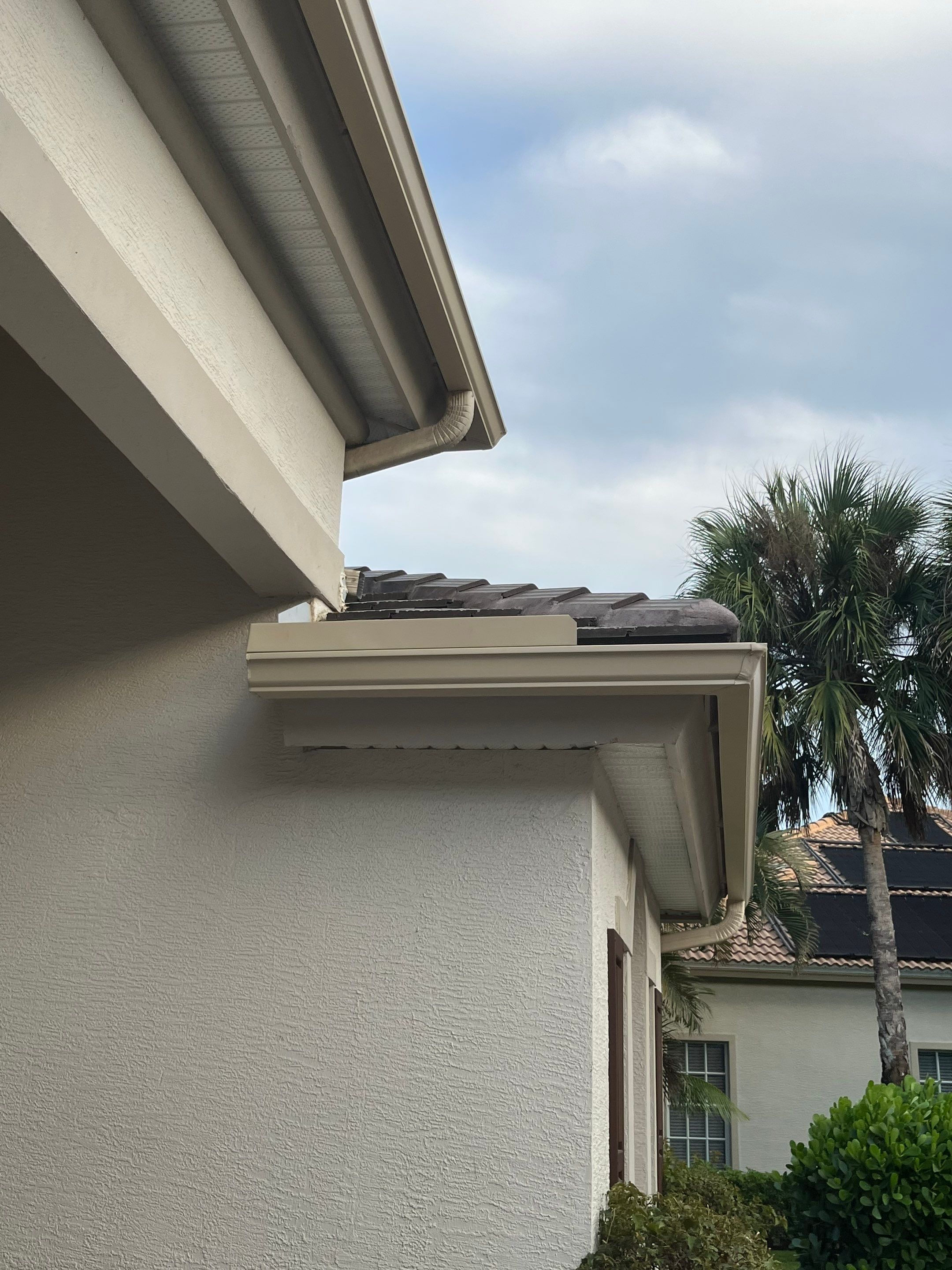 6-inch K-style Gutters with New Splash Guard in Bonita Spring FL by Gutter Professors