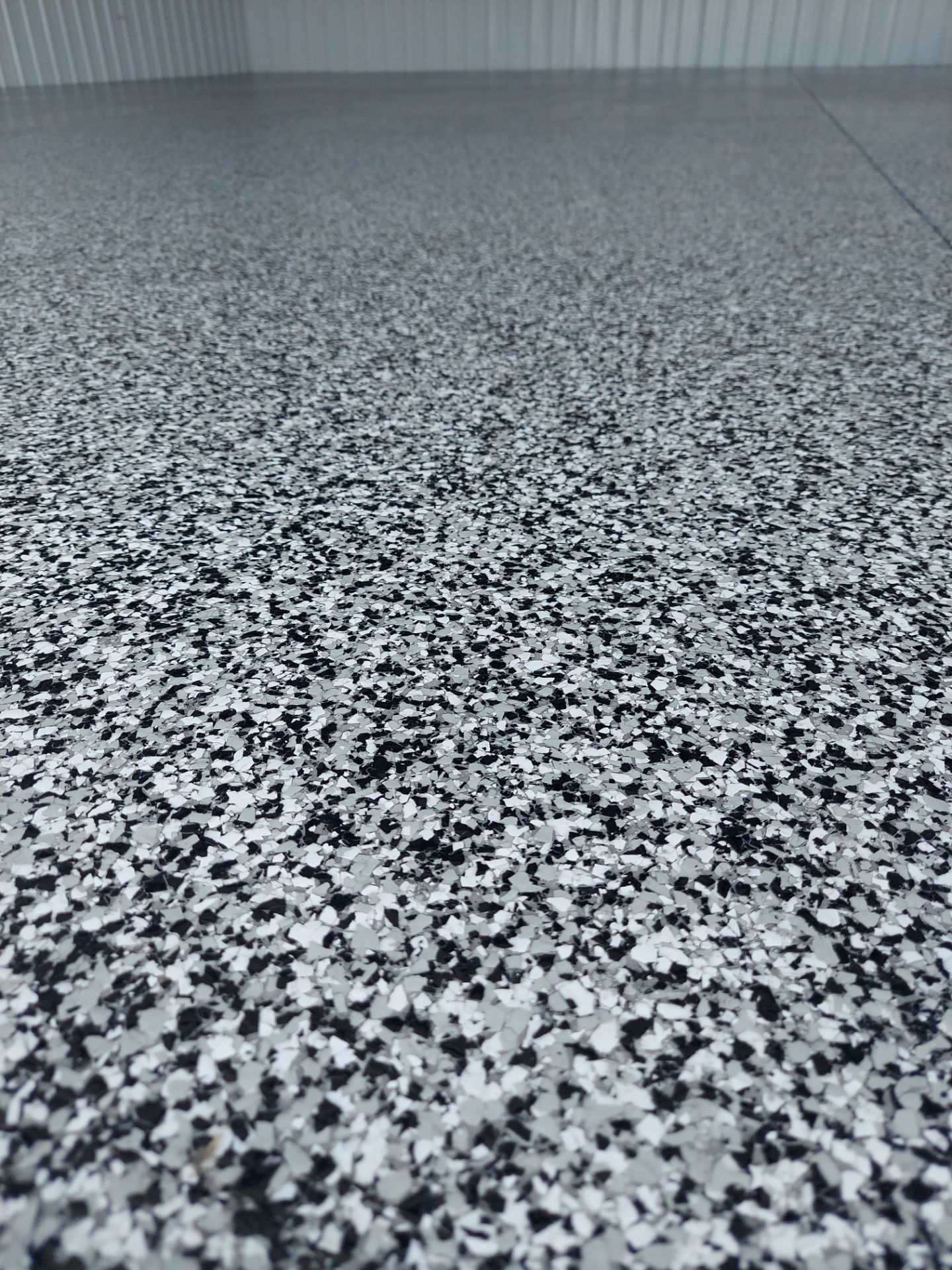 Garage Floor Coating with Domino by Copperhead Coatings