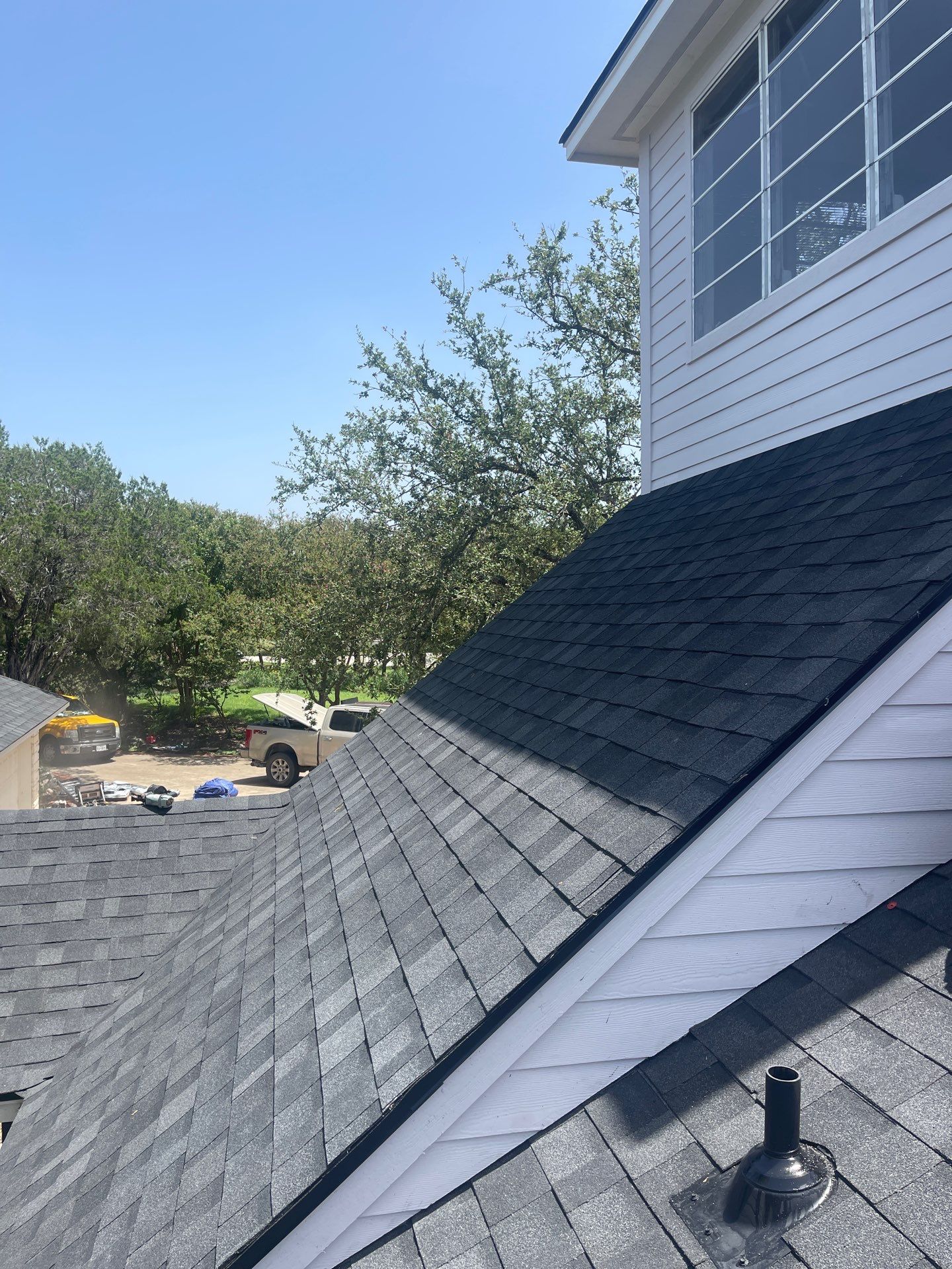 Residential Roofing Installation using IKO Nordic Granite Black by DeZign Roofing & Exteriors