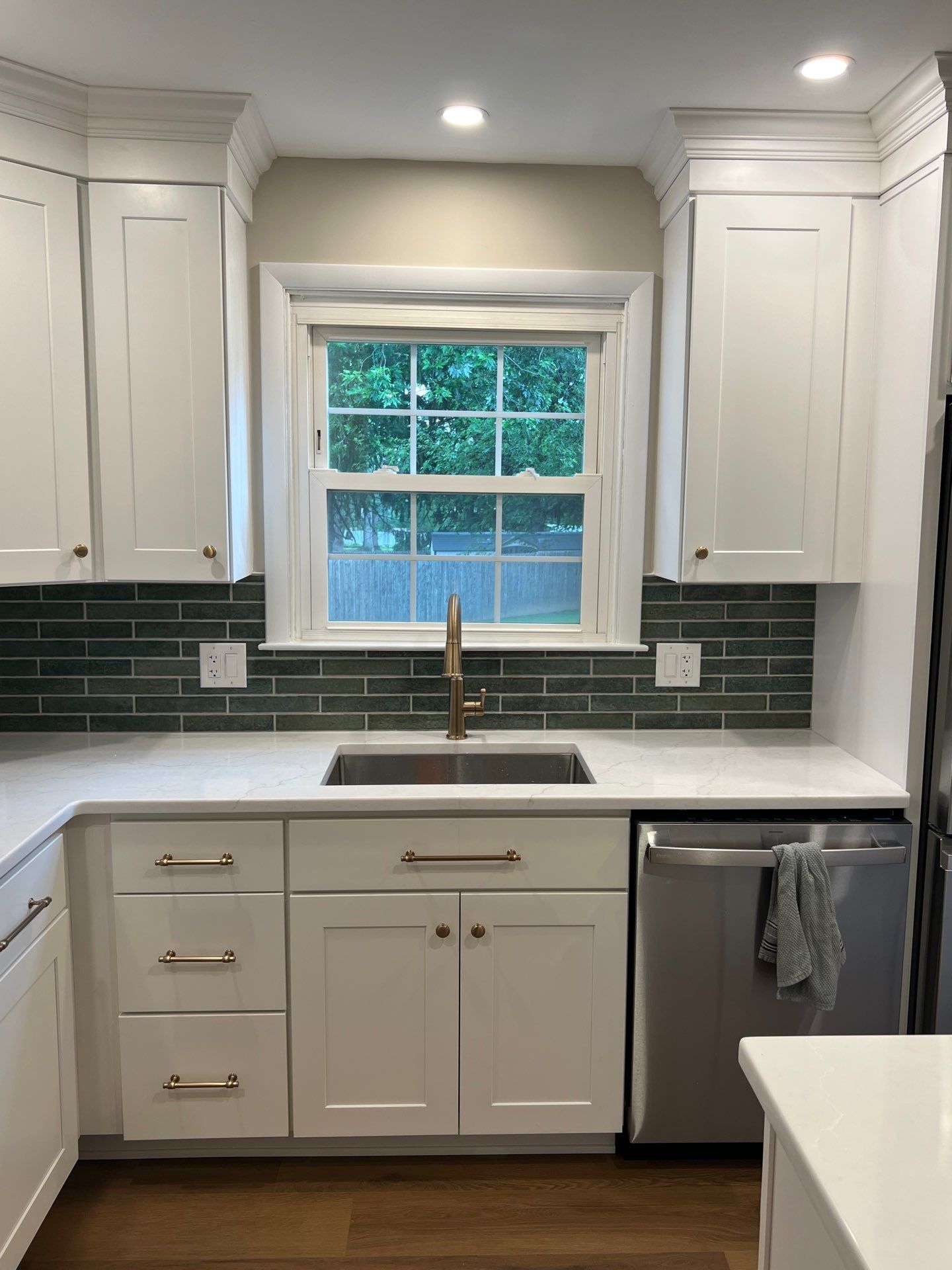 Phoenixville Kitchen Remodel with White Shaker Cabinets and Green Backsplash by Reliable General Contracting