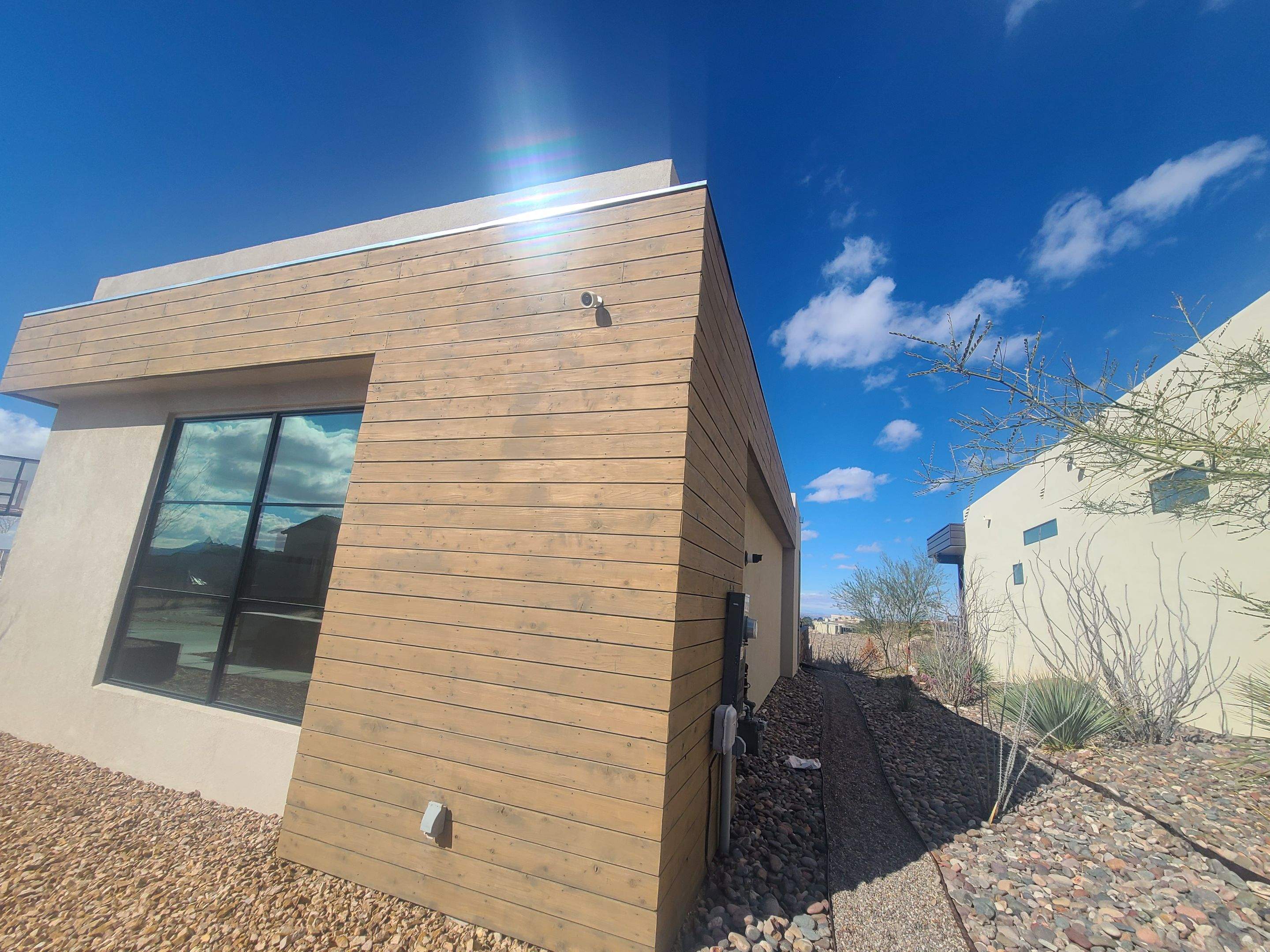 Exterior Wood Staining and Composite Decking Installation by Regal Renovate