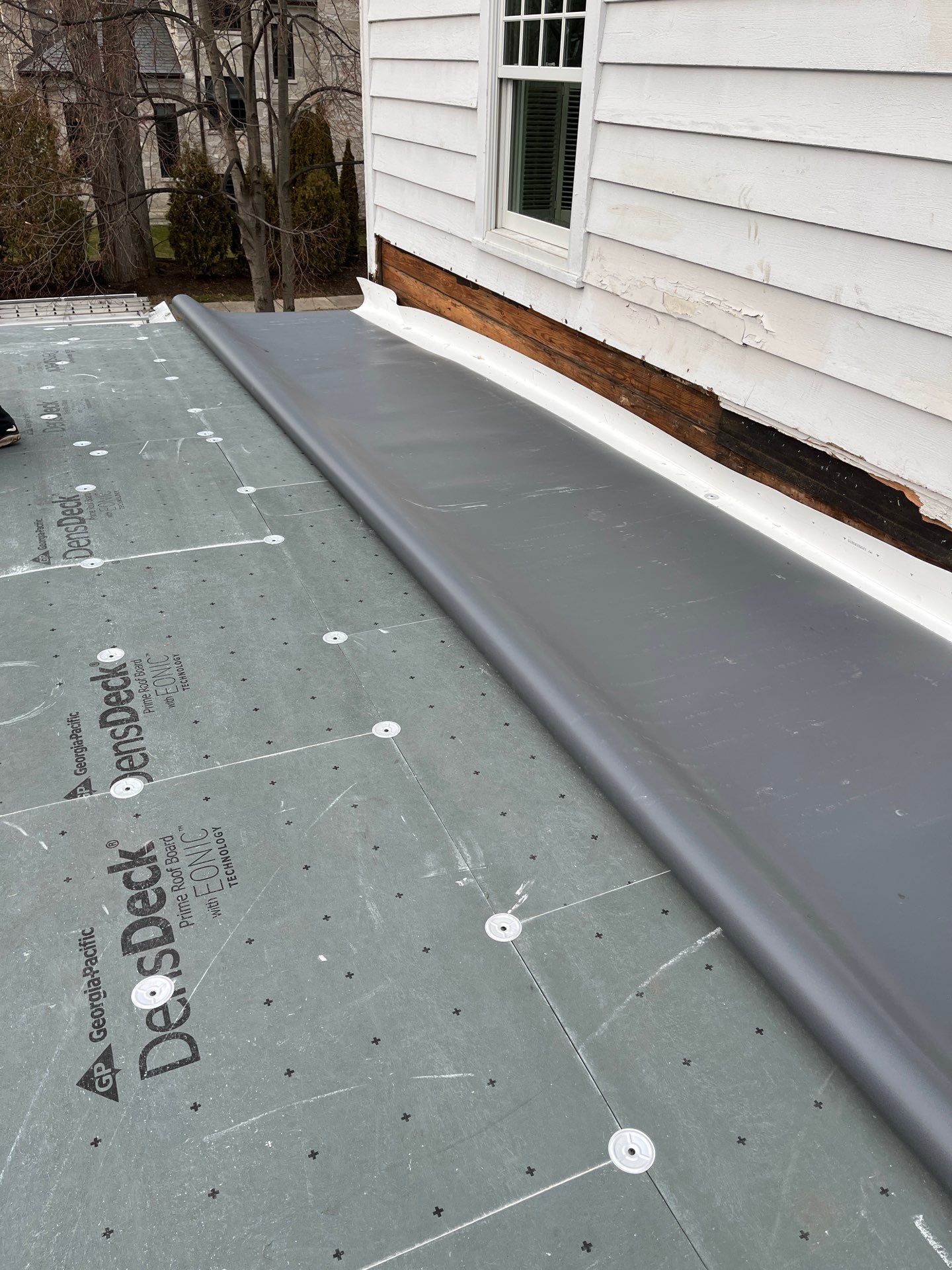Asphalt Roof Replacement with Half Round Copper Gutter Installment by Custom Installations