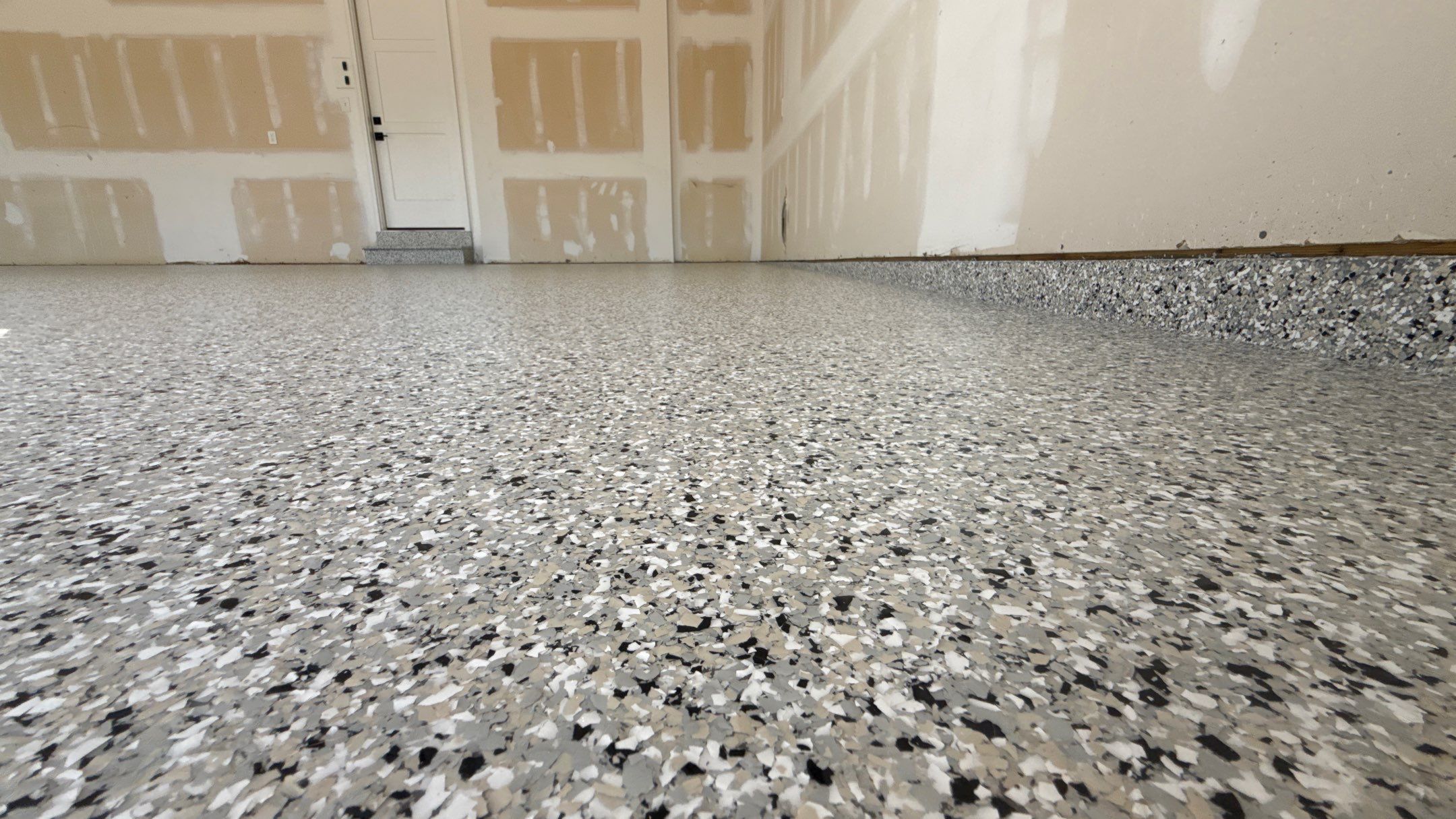 Comprehensive Garage Renovation Featuring Epoxy Flooring by Banner Garage
