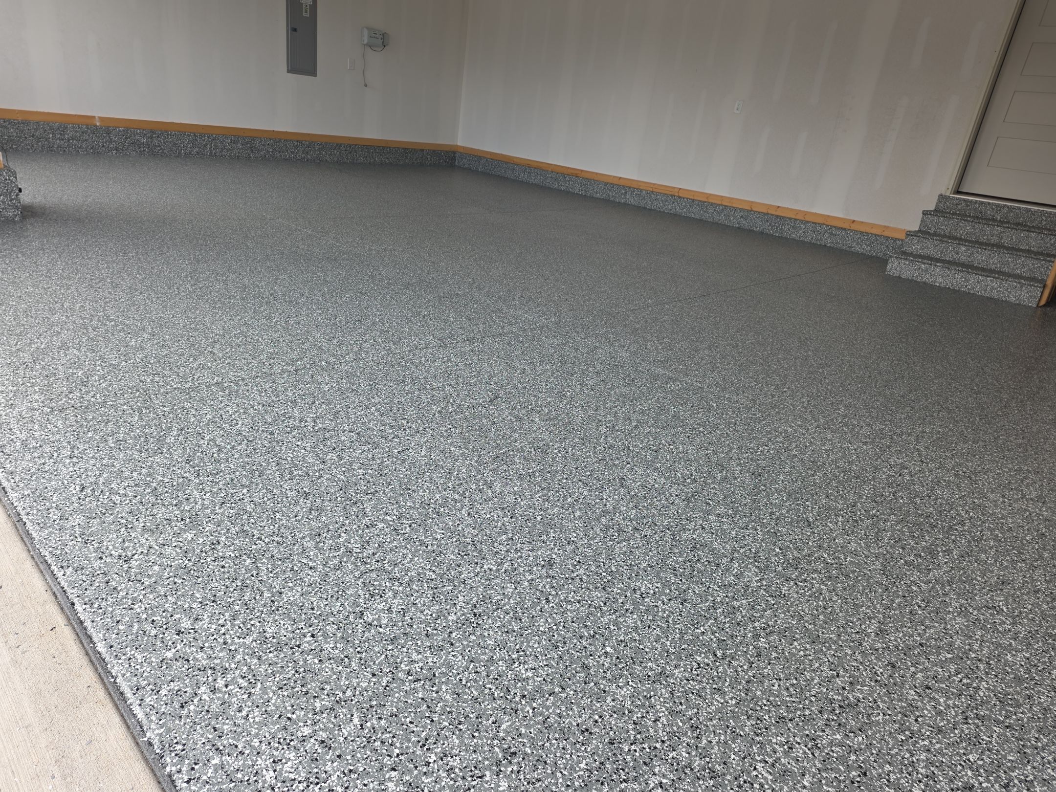 Garage Transformation with Wombat Flake! by Revival Concrete Coatings