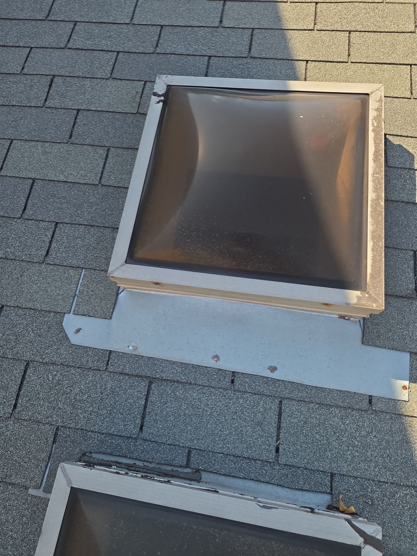 Asphalt Shingle Roof Repair and Skylight Sealing in Houston by One Legacy United