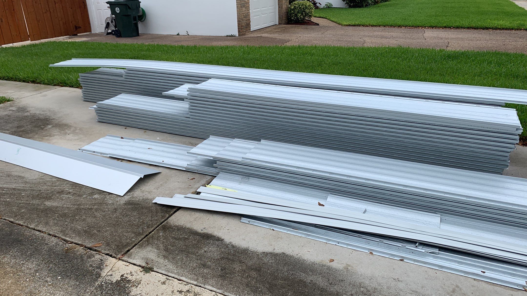 Residential Roofing Installation using 1" Nail strip metal roof by BLUES BROTHERS ROOFING