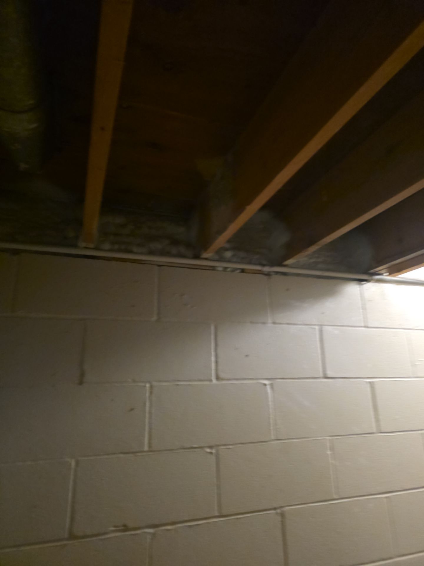 Closed cell spray foam insulation in side attics and basement rim joists in Burnsville MN by Gunner Insulation and General Contracting