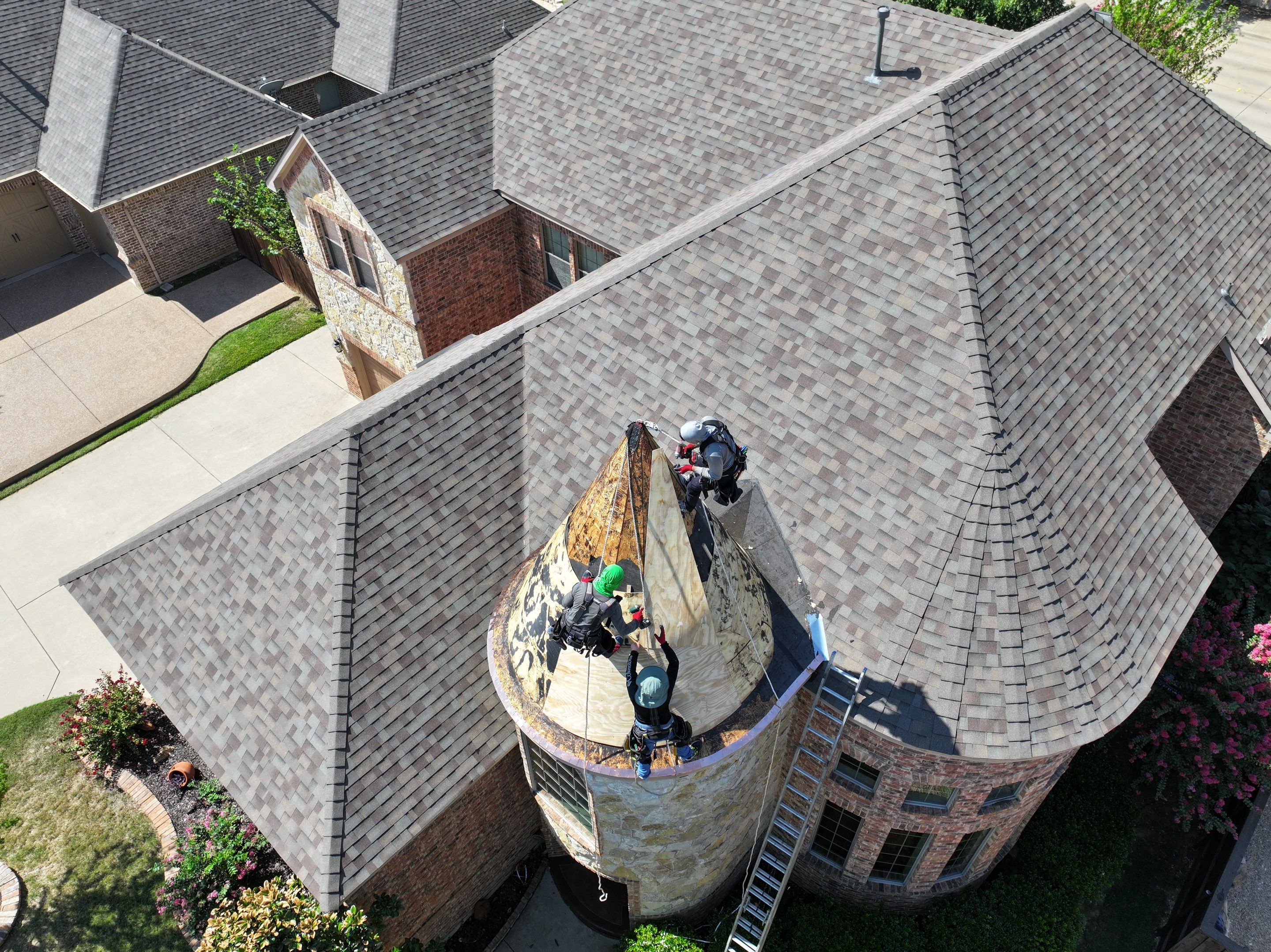 Installing Custom copper turret and Malarkey Vista Class 4 shingles Hail Damage Upgrade by Becker Roofing and Exteriors