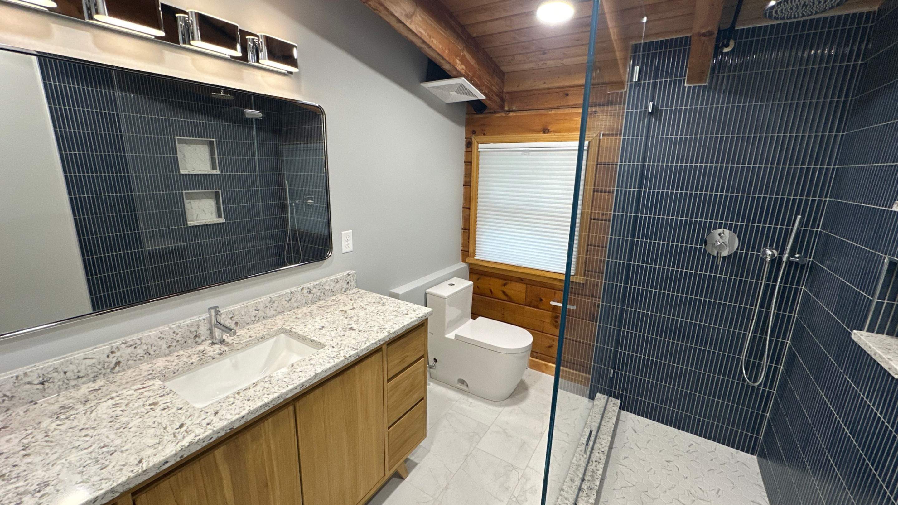 Brandt Double Bathroom Remodels by Integrity Tile and Home LLC