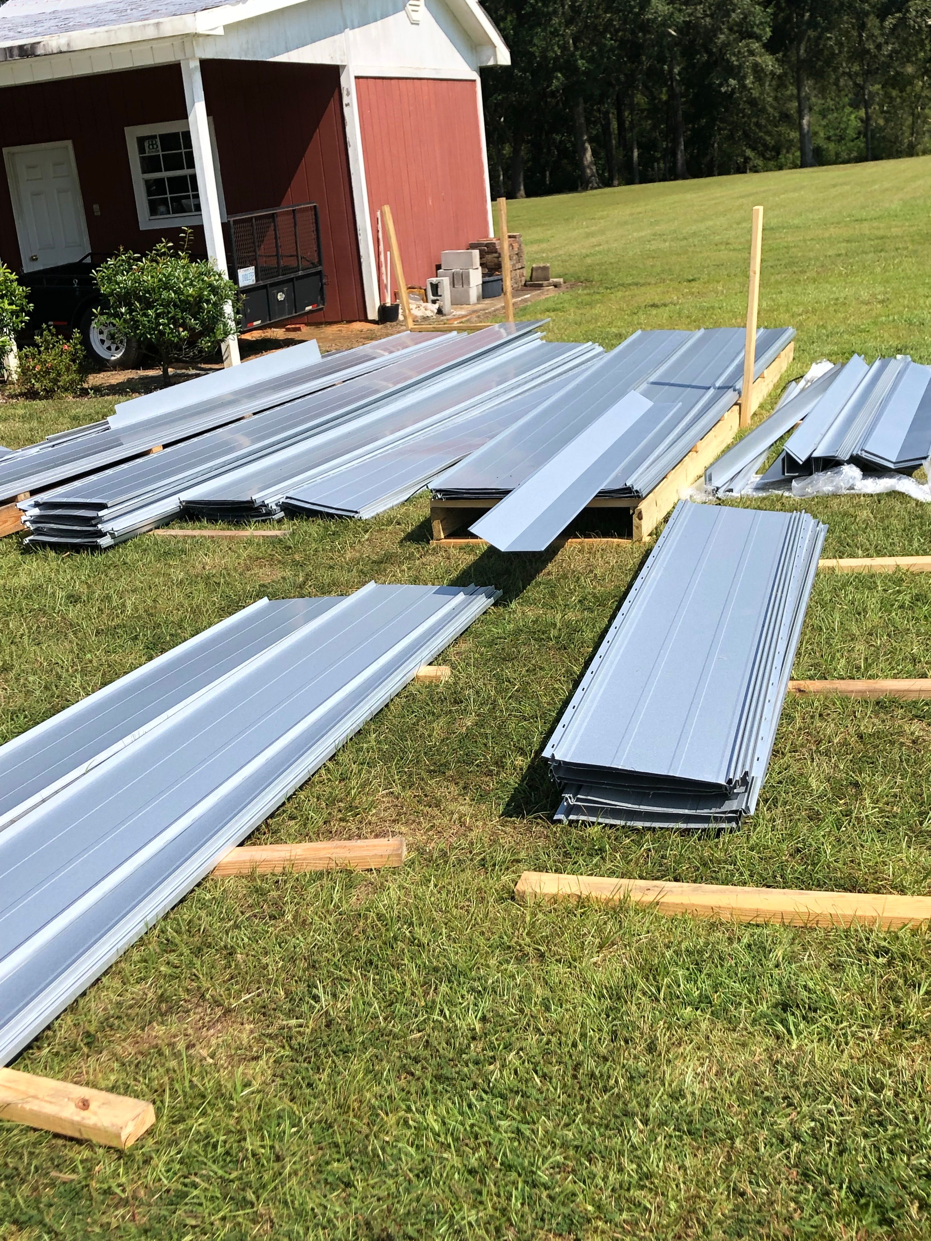 Residential Roofing Installation using Metal roofing by American Roofing & Construction LLC