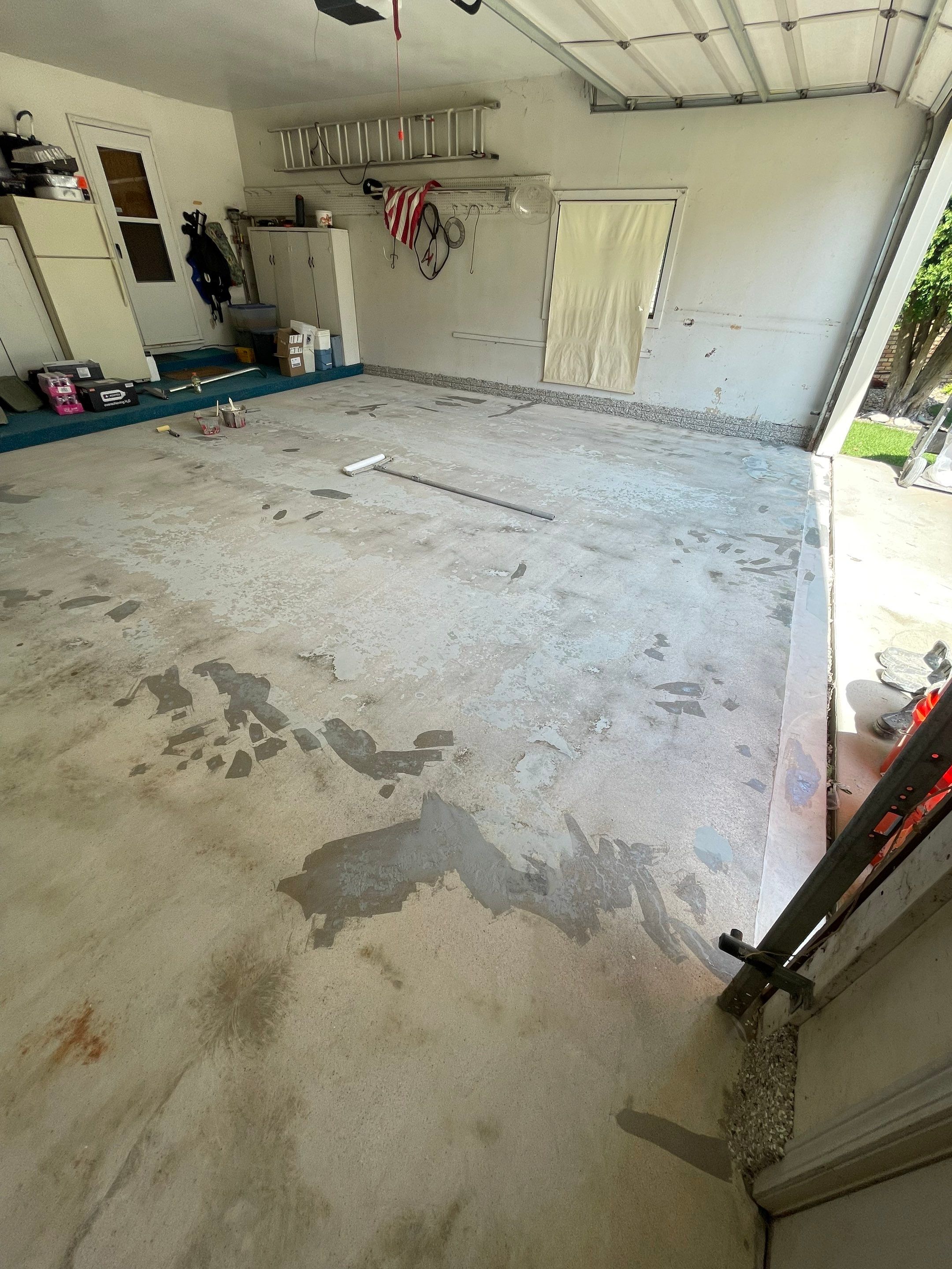 Custom Creekbed Garage Floor Coating in Sioux Falls by Select Painting, Coatings & Garage Cabinets