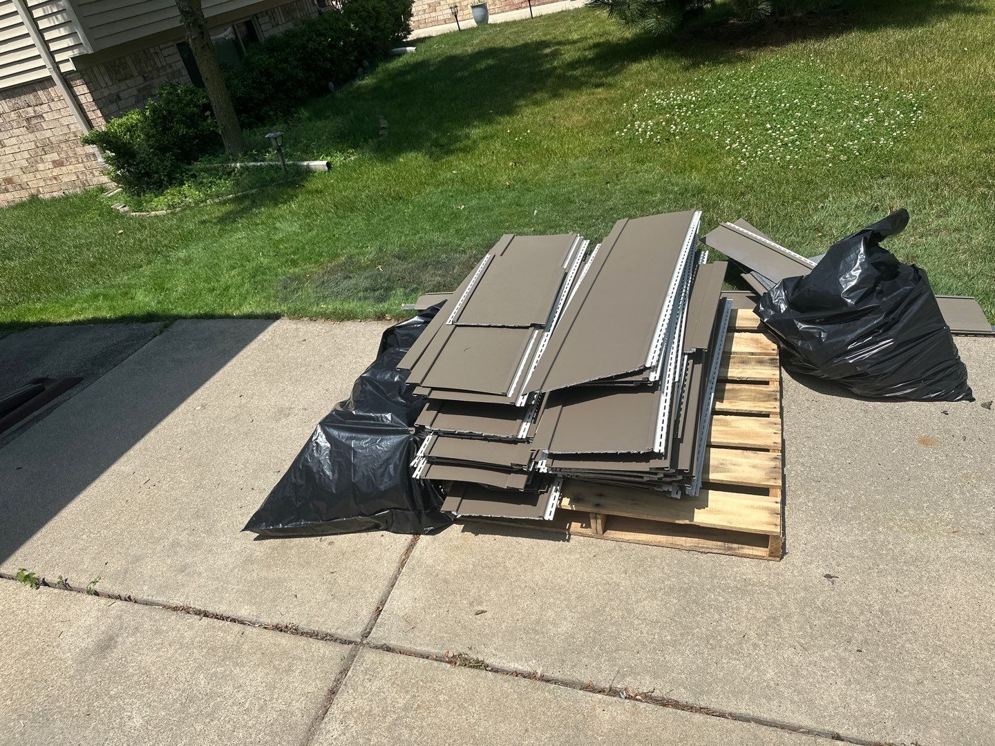 Siding Installation using Ascend 7" Composite Flagship Brown by 180 Contractors