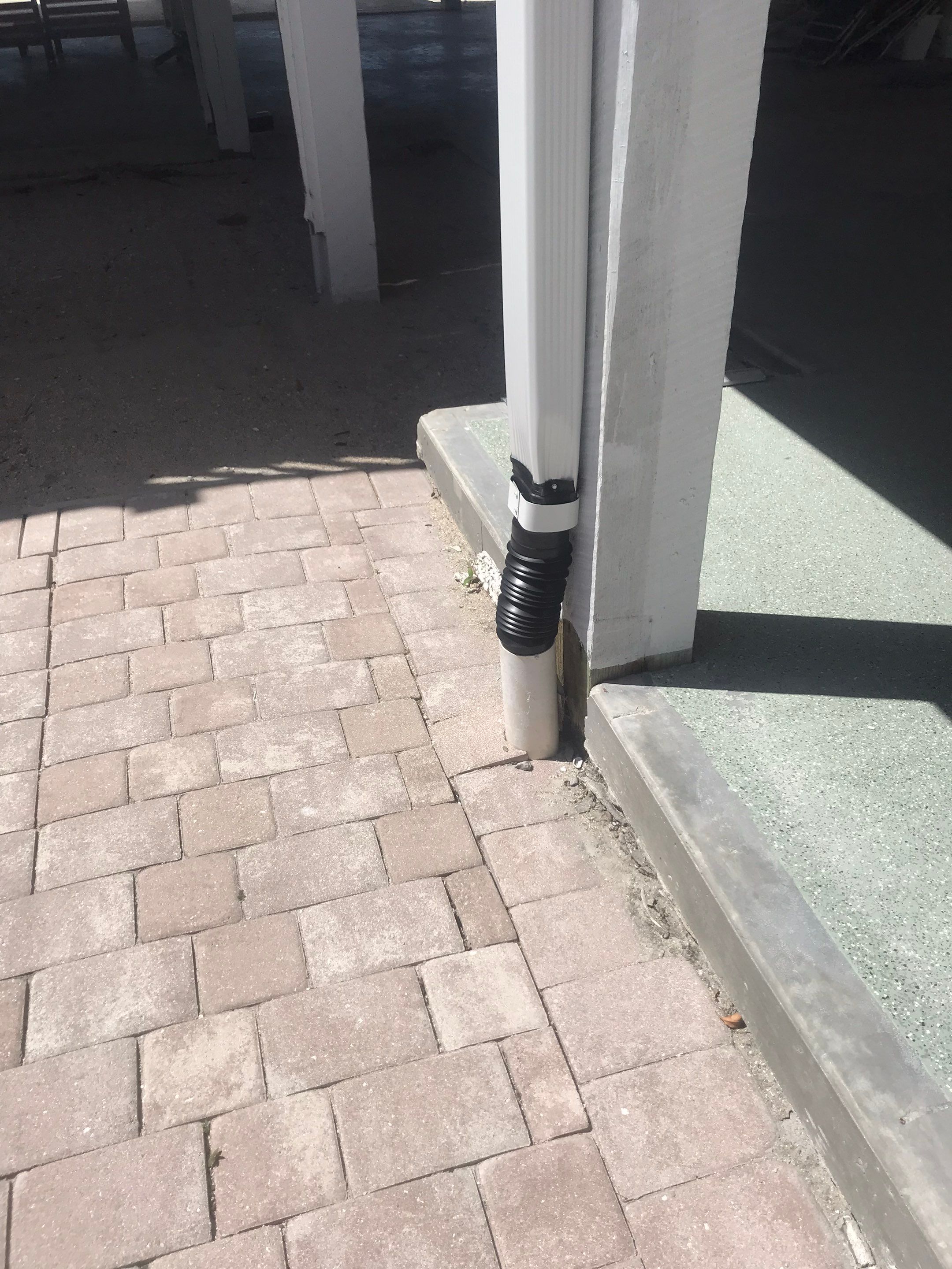 Downspout Installation using Downspout Extension in Sanibel FL by Gutter Professors