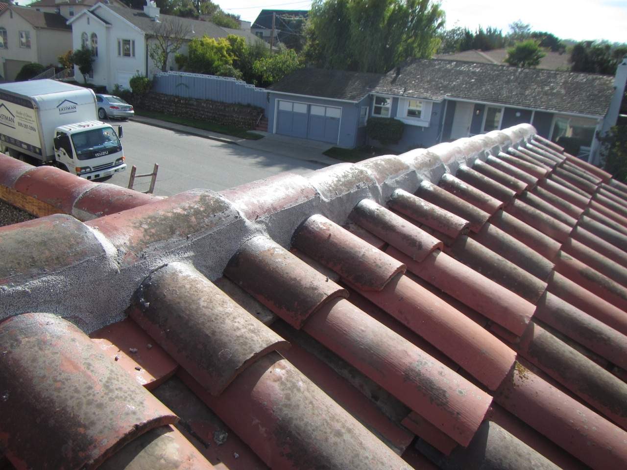 Millbrae Residential Reroof with Terracotta Clay Tiles and Synthetic Underlayment by Eastman Roofing & Waterproofing Inc.