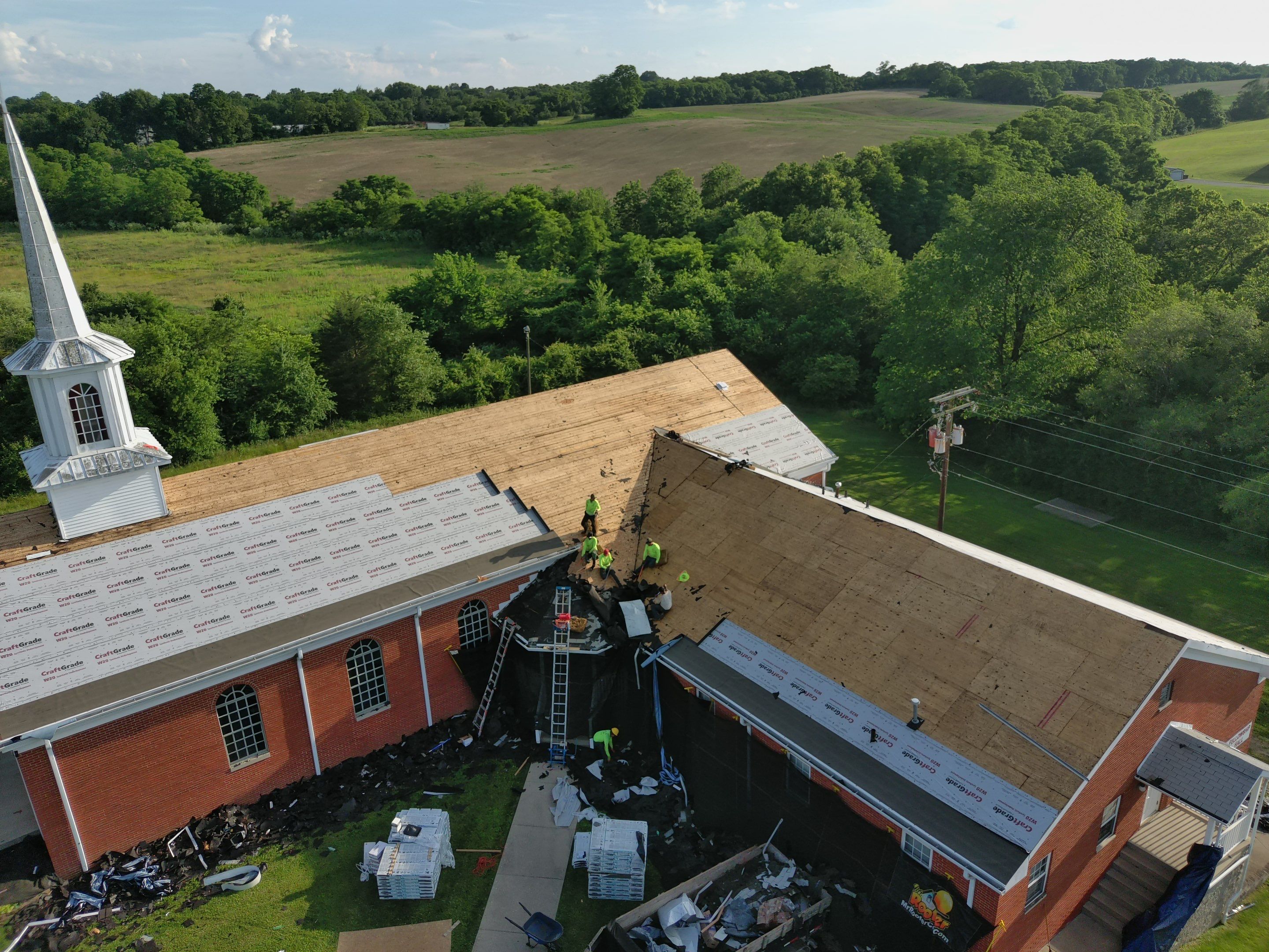 Commercial Roofing Installation using Performance Shingles by Mr. Roofer