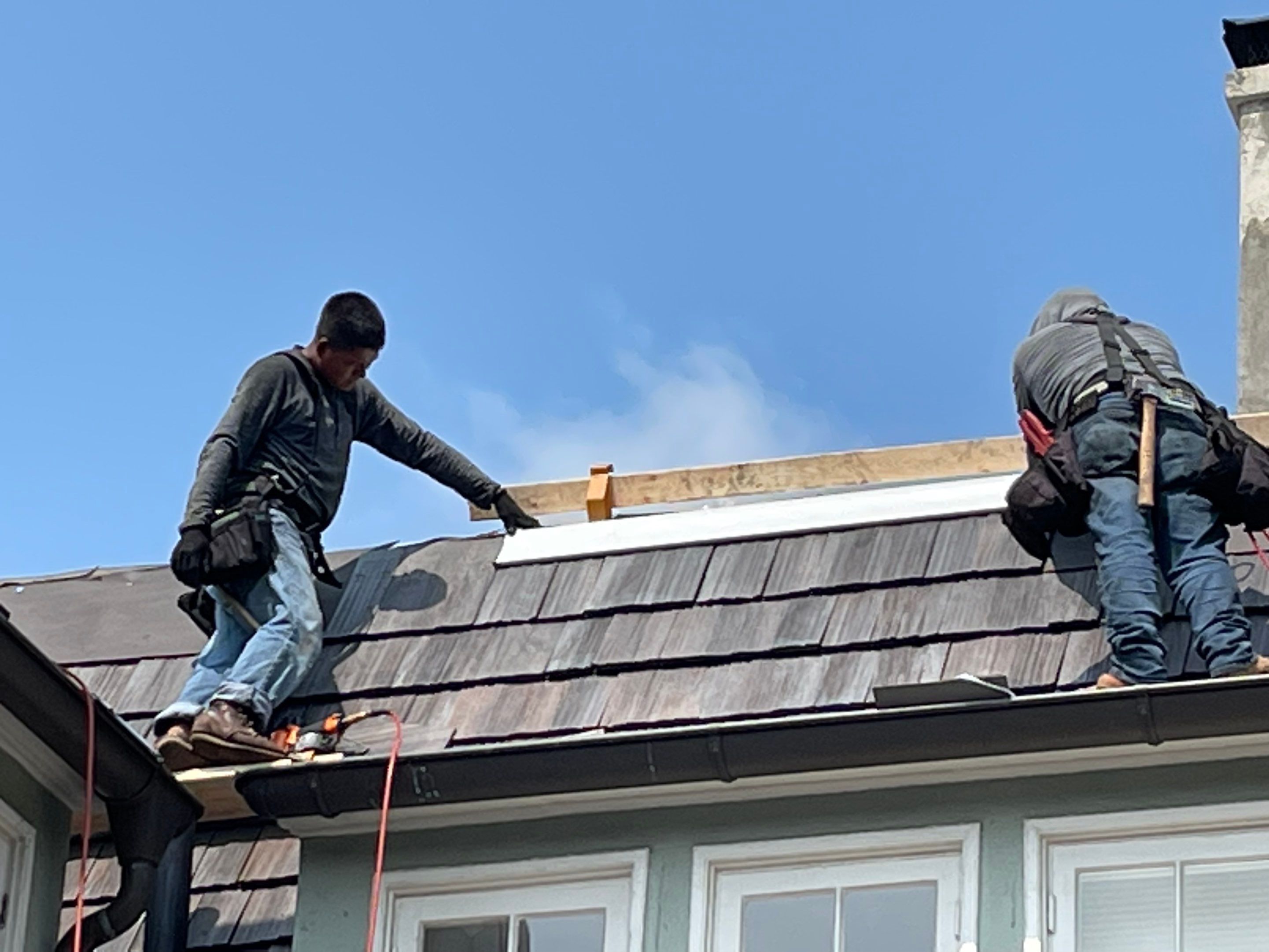 Slate removal/Cedar Shake replacement by Storm Contracting 