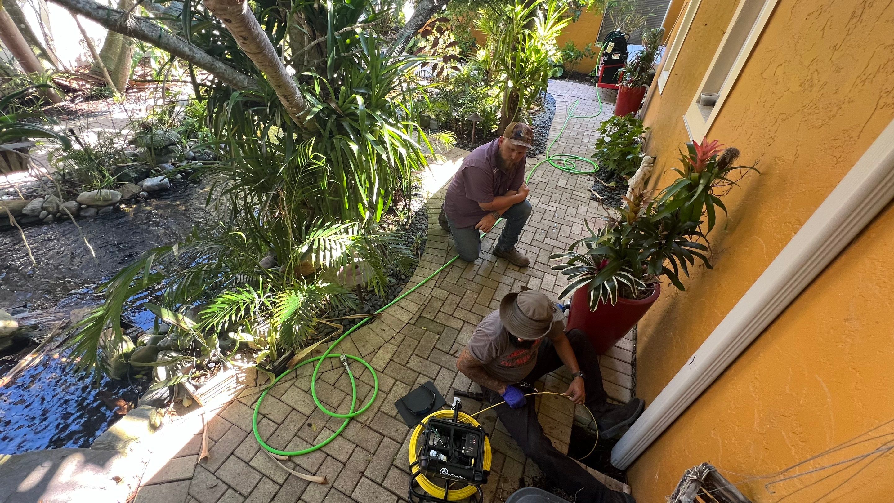 Residential Stormwater Gutter Drain System Maintenance by APS Power & Water