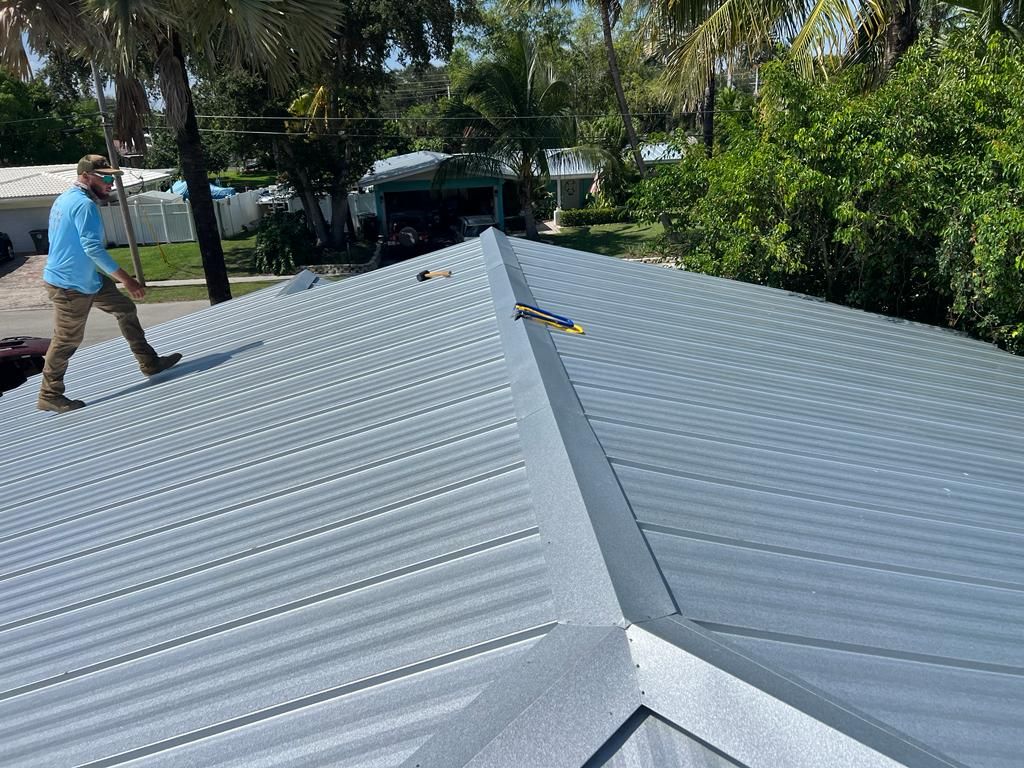 Residential Roofing Installation using 1" Nail strip metal roof by BLUES BROTHERS CONSTRUCTION CORP