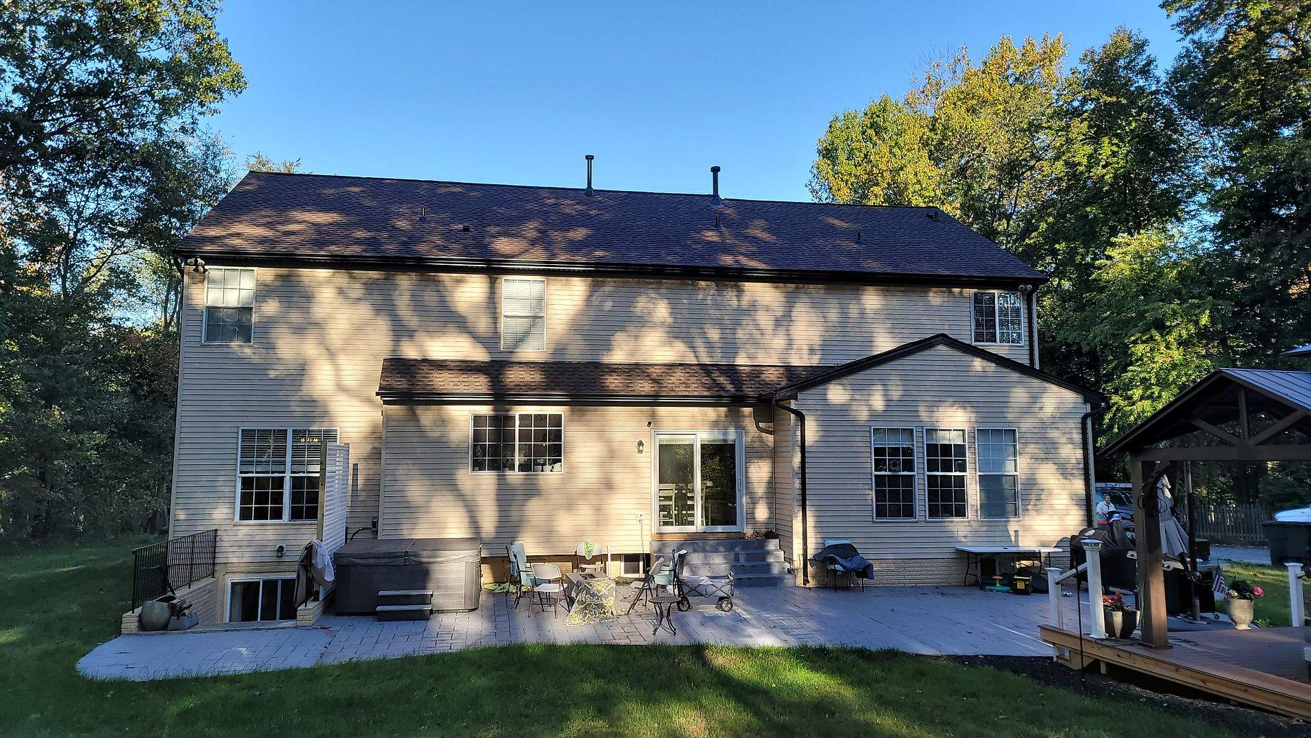 Gutter Installation using Black Gutters, soffit & fascia by Roof Right Inc