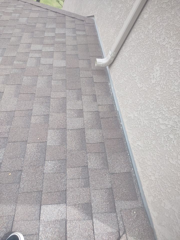 Roof Damage by Bros Roofing