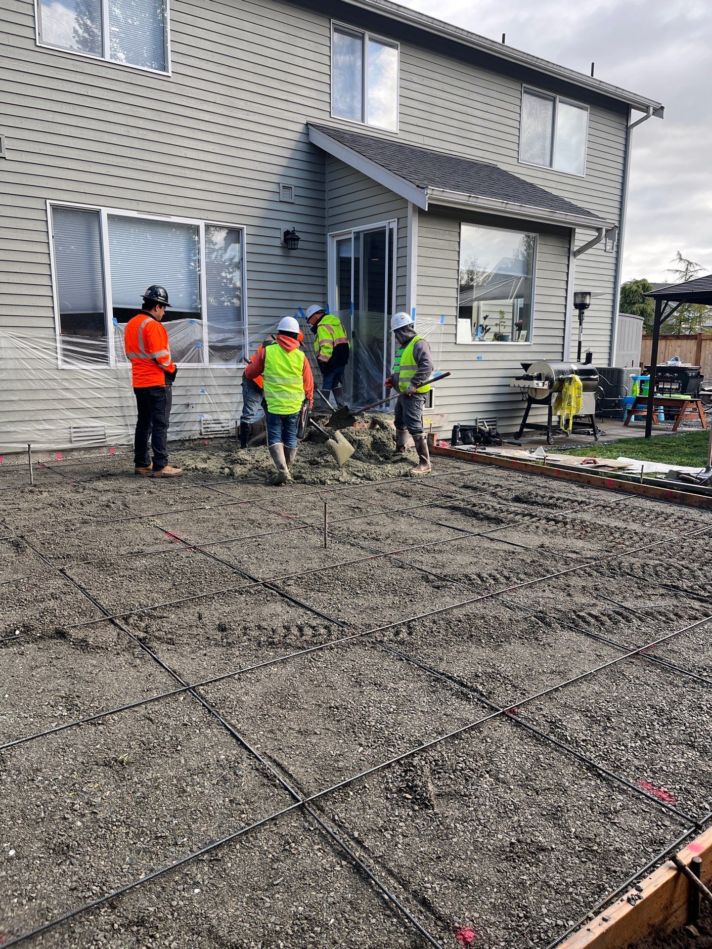 Benedict | Stamped Concrete Back Patio by Jireh Asphalt & Concrete Inc 