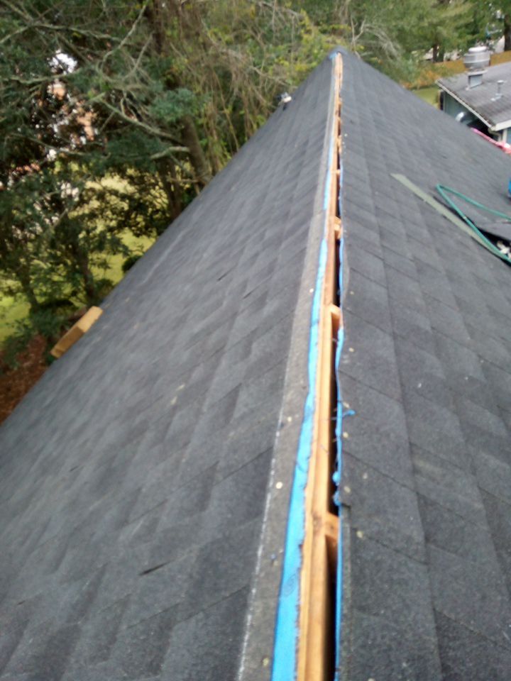 Residential Roofing Installation using Roof Replacement by American Roofing & Construction LLC