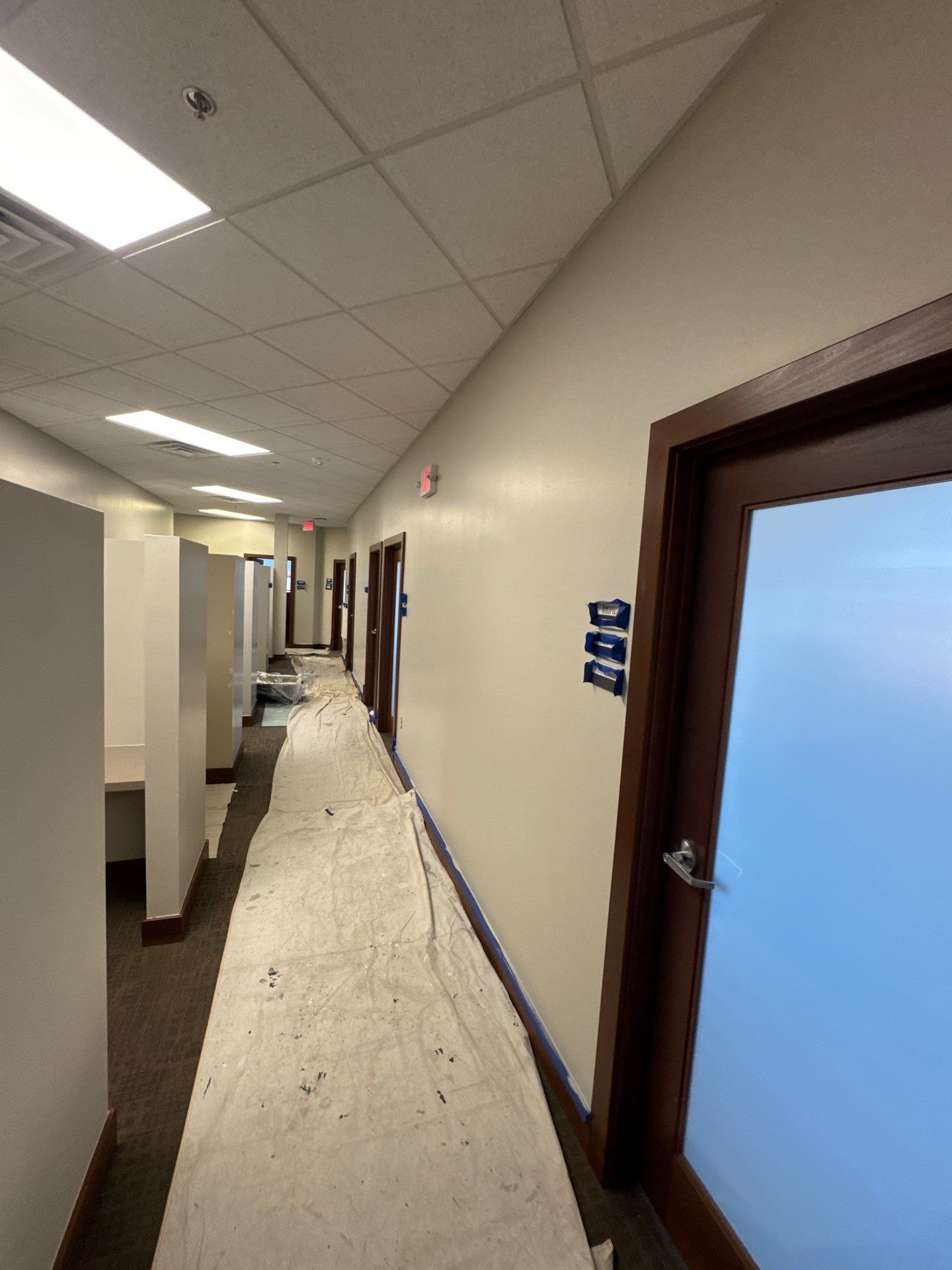 Commercial Office Interior Remodel and Modern Suite Refresh in Sioux Falls by Select Painting, Coatings & Garage Cabinets