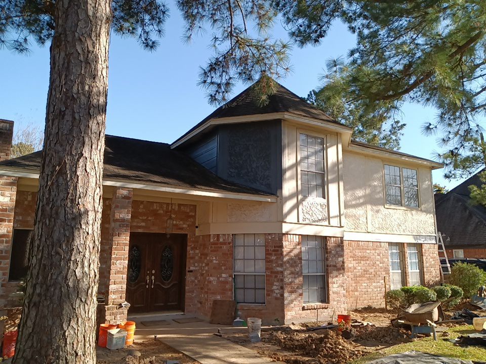 Interior and exterior painting project by Roof Concepts Construction