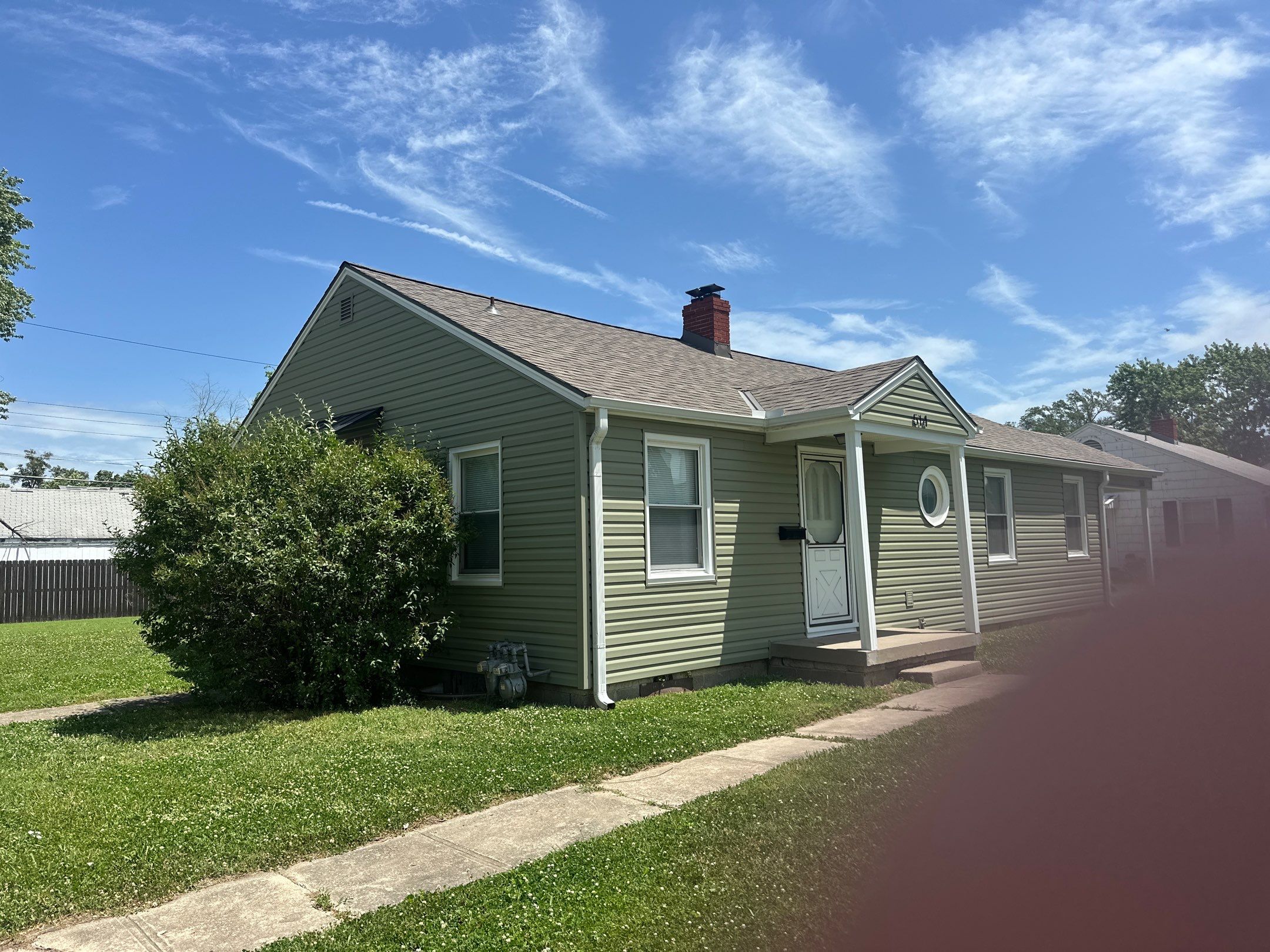 New Cypress Siding going on this North Kansas City Home  by EEC  Windows, Siding & Roofing 