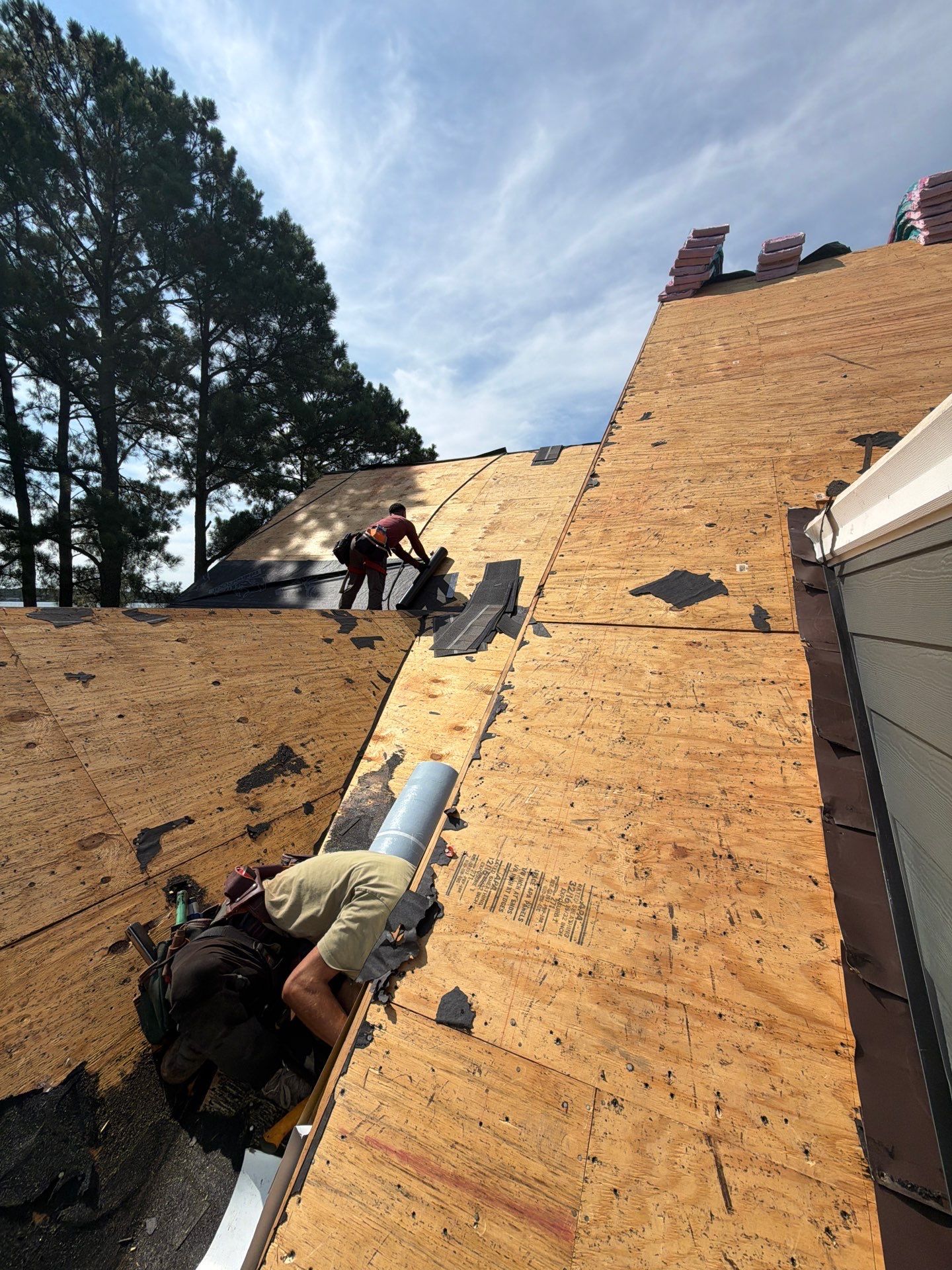 Roof Replacement and White Gutter Installation in Gloucester by Cade Construction