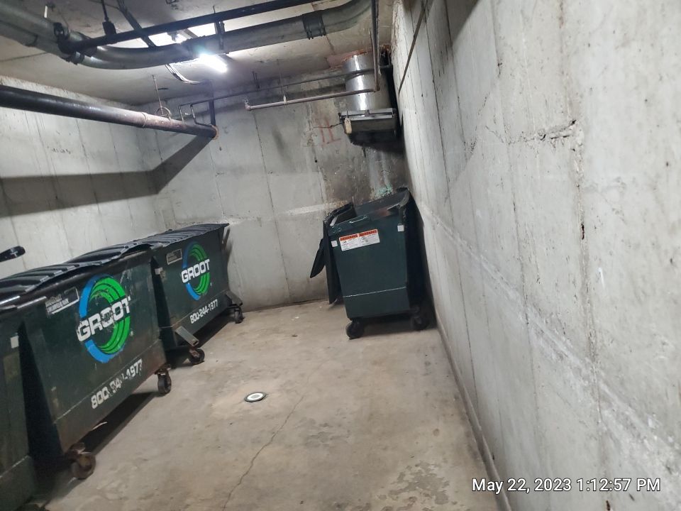 Parking garage using Hot water by Northern Power Washing LLC.