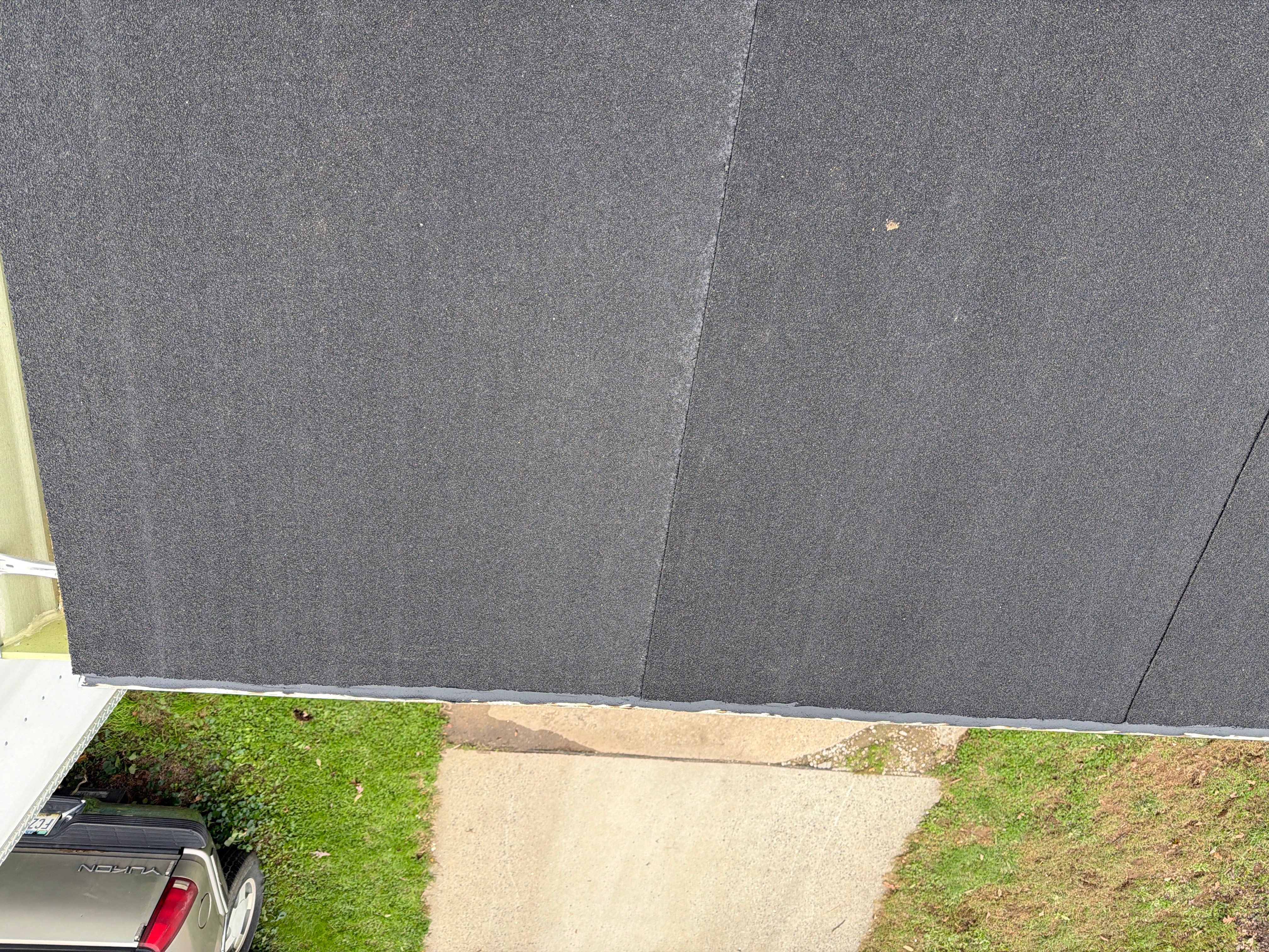 Flat Roof Replacement and Shingle Integration in Levittown by Stofan Construction LLC