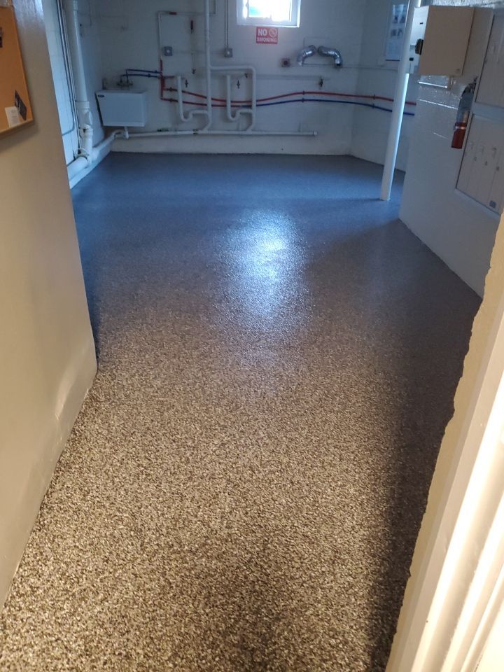 Laundry Room Floor Coating using Penntek by Spectrum Painting, LLC