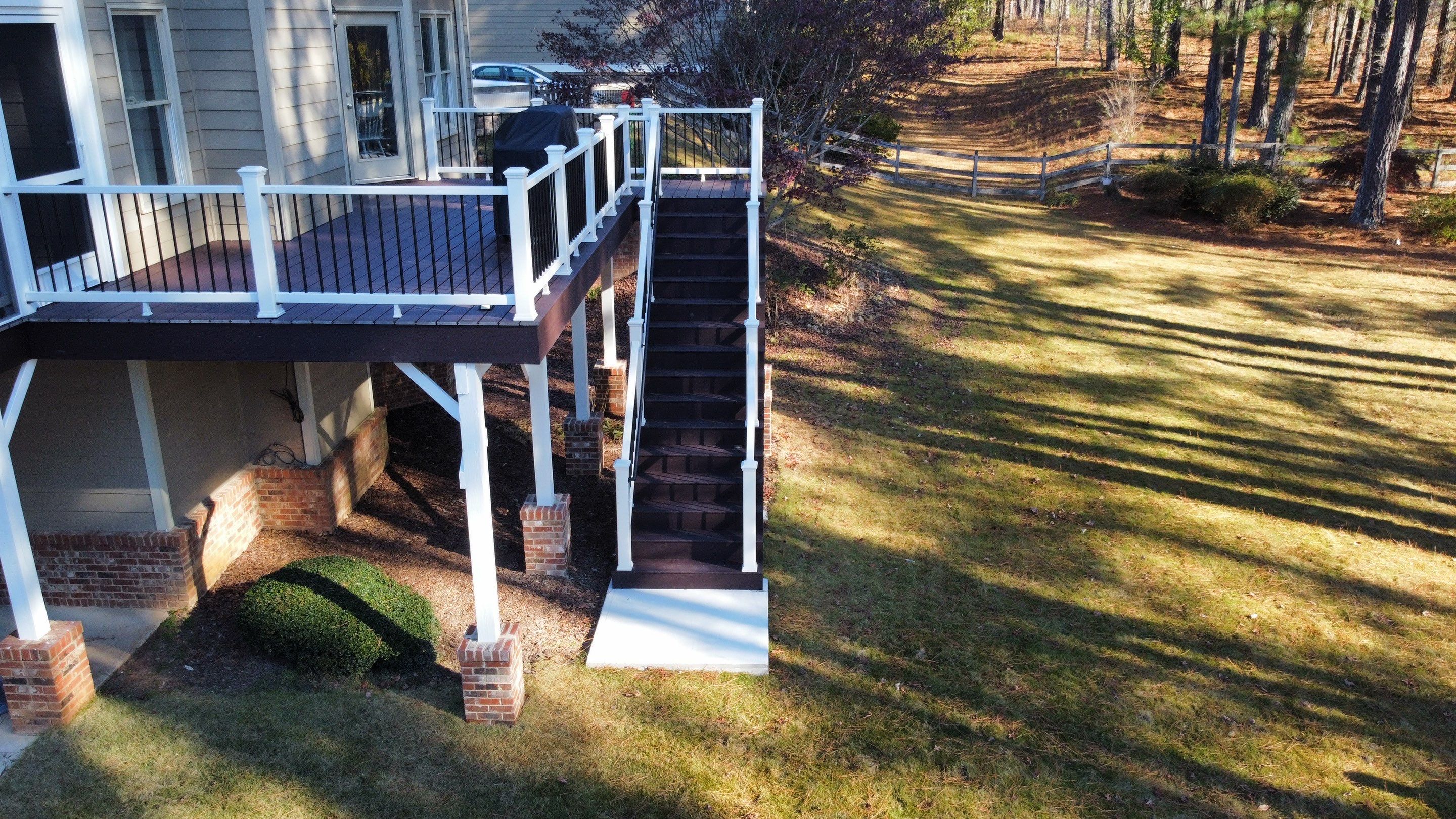 Multi-Level Composite Deck and Screened Porch in Acworth by Swift Home Renovations 
