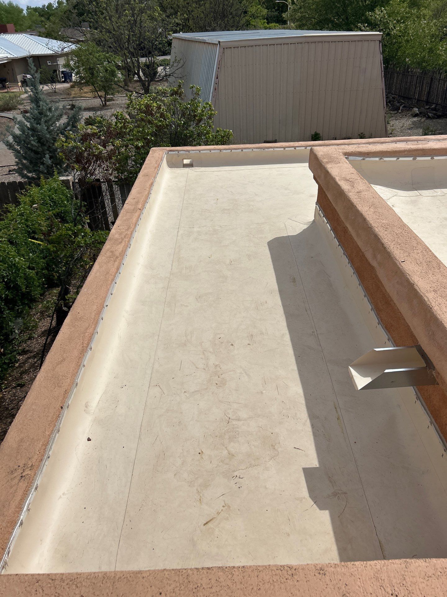 Residential TPO Flat Roof Replacement and Skylight Installation in Albuquerque by Doyle Roof Masters Inc